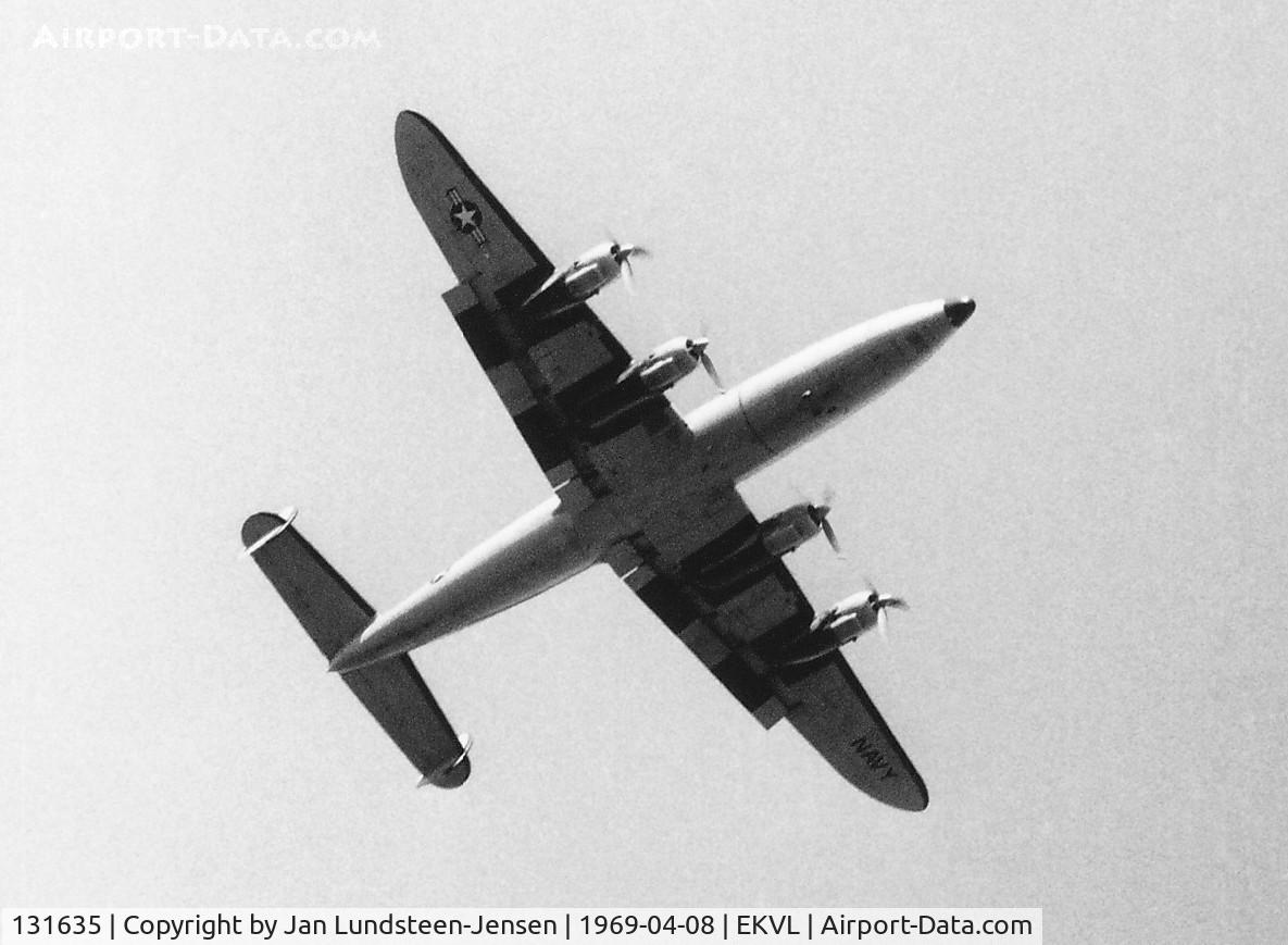 131635, 1953 Lockheed VC-121J Super Constellation C/N 4136, Super Constellation of US Navy seen shortly after takeoff from Runway 10 at Vaerloese Air Base in Denmark in 1969. The aircraft was later repainted without the black underwing areas behind the engines.
