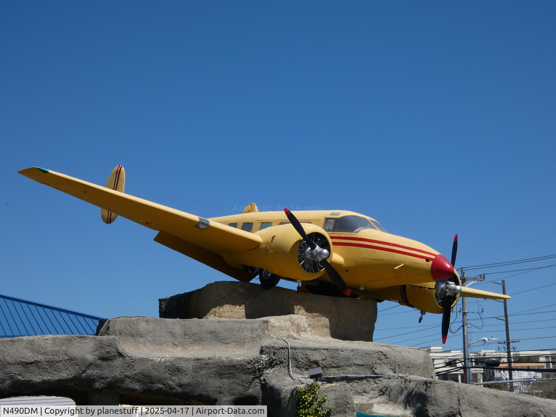 N490DM, 1946 Beech D18S C/N A-89, On display at a minigolf course