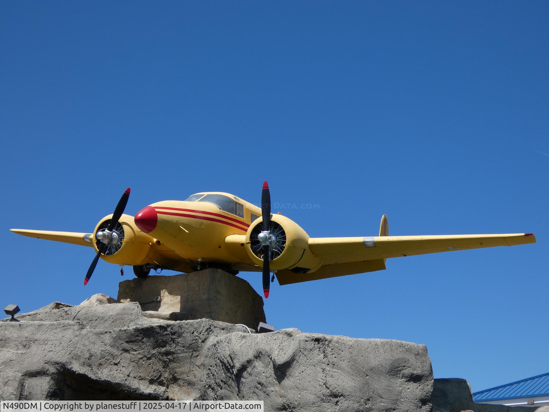 N490DM, 1946 Beech D18S C/N A-89, On display at a minigolf course