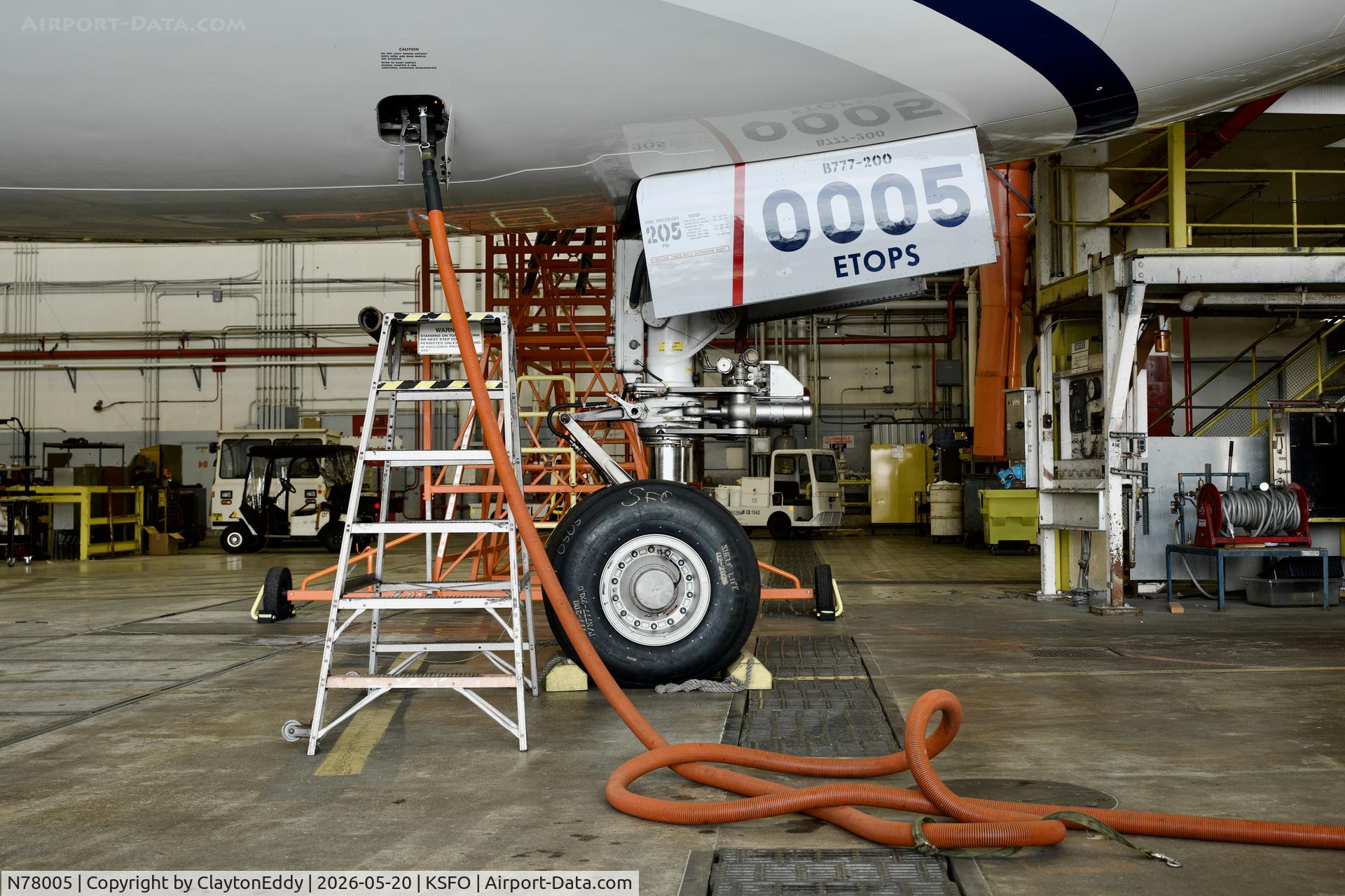 N78005, 1998 Boeing 777-224, c/n 27581, Nose gear SFO 2026. 
