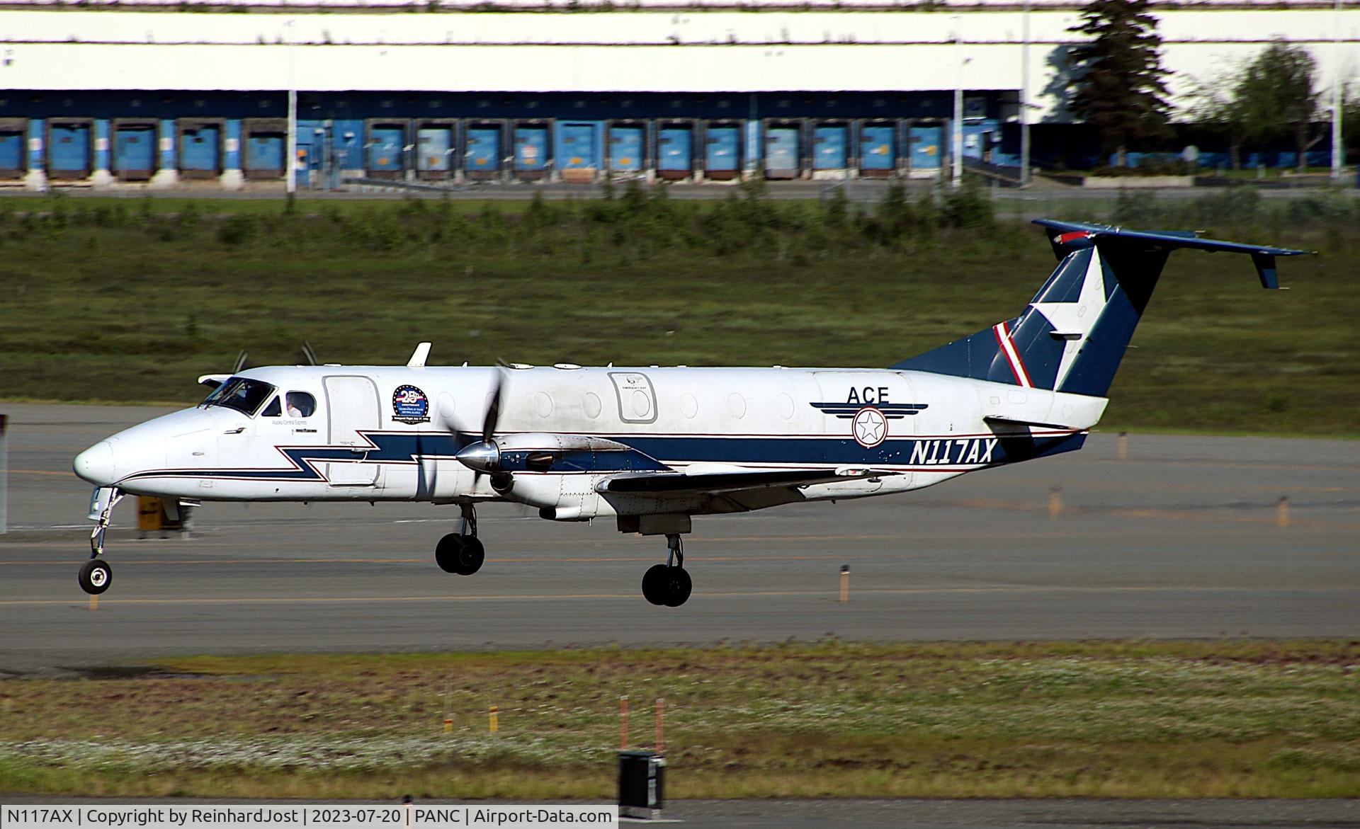 N117AX, 1989 Beech 1900C-1, c/n UC-79, Alaska Central Express Beech with a sticker celebrating 25 Years of Service on short final at Anchorage International