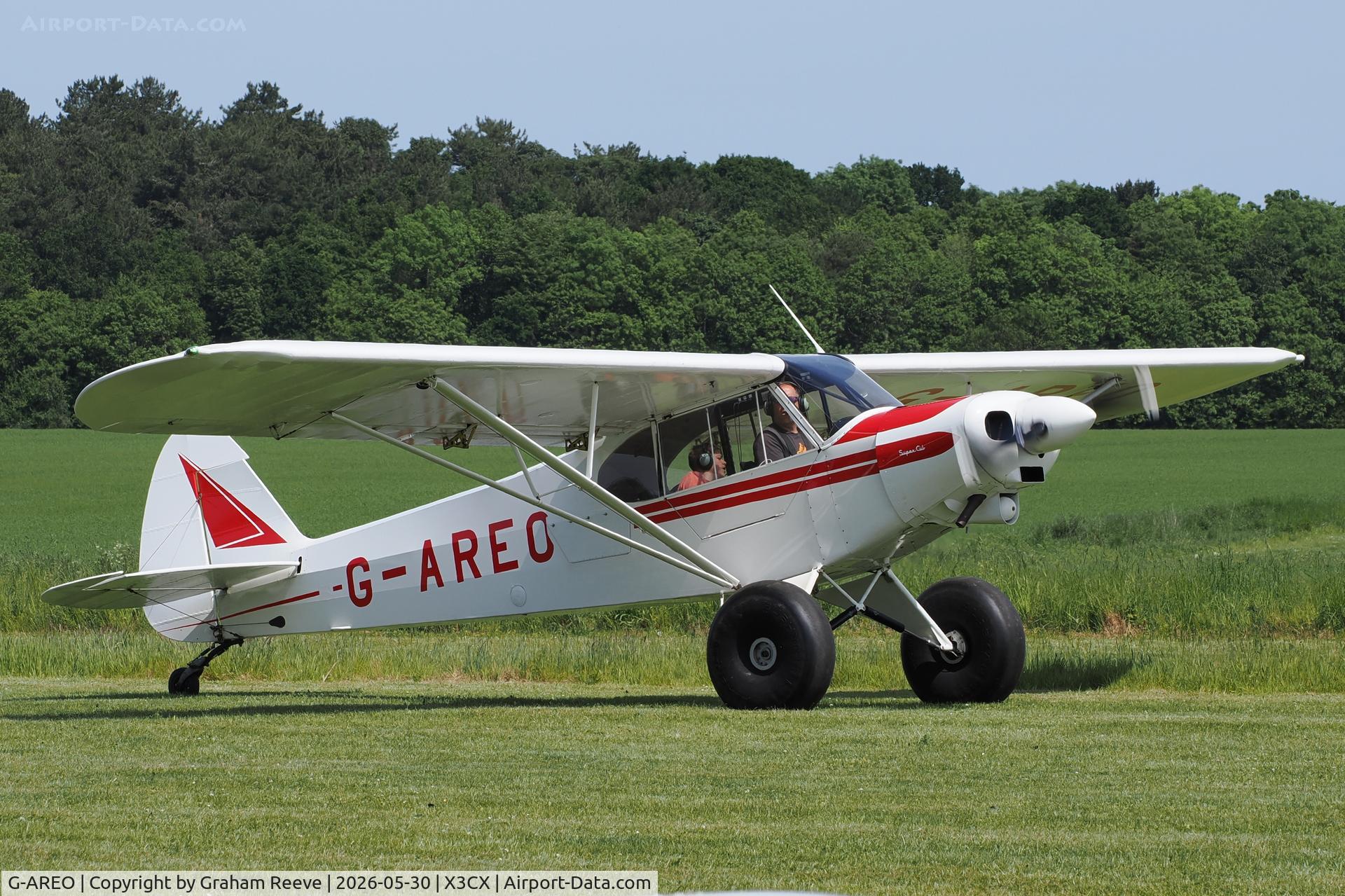 G-AREO, 1960 Piper PA-18-150 Super Cub, c/n 18-7407, Just landed at Northrepps.
