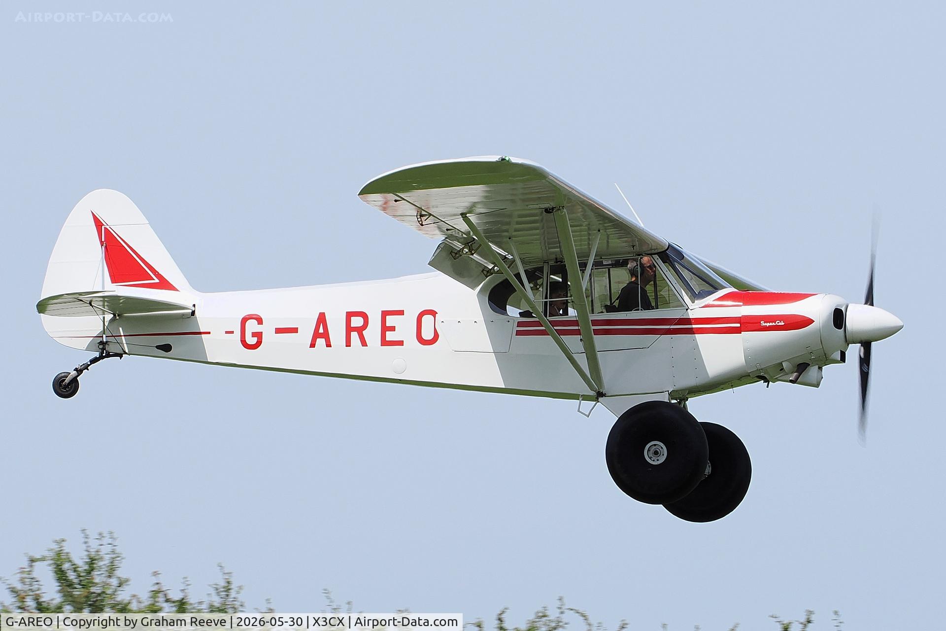 G-AREO, 1960 Piper PA-18-150 Super Cub, c/n 18-7407, Landing at Northrepps.