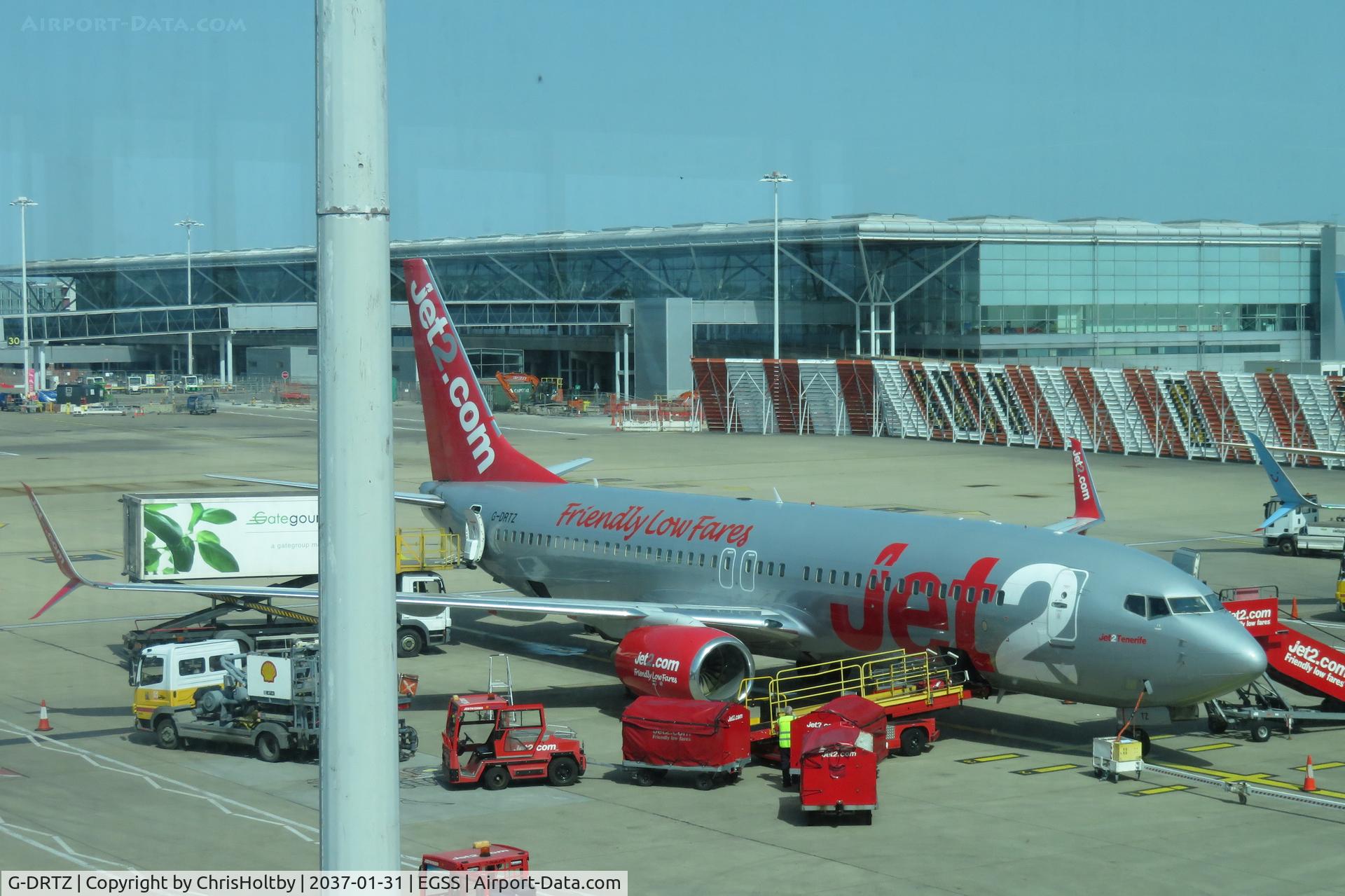 G-DRTZ, 2004 Boeing 737-8AS, c/n 33557 l/n 1438, Being serviced at Stansted,  London