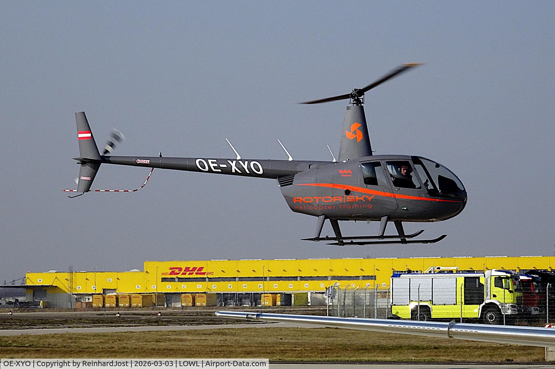 OE-XYO, Robinson R44  Raven, c/n 2719, Raven of Rotor Sky Helicopter Training hoovering at Linz-Hörsching