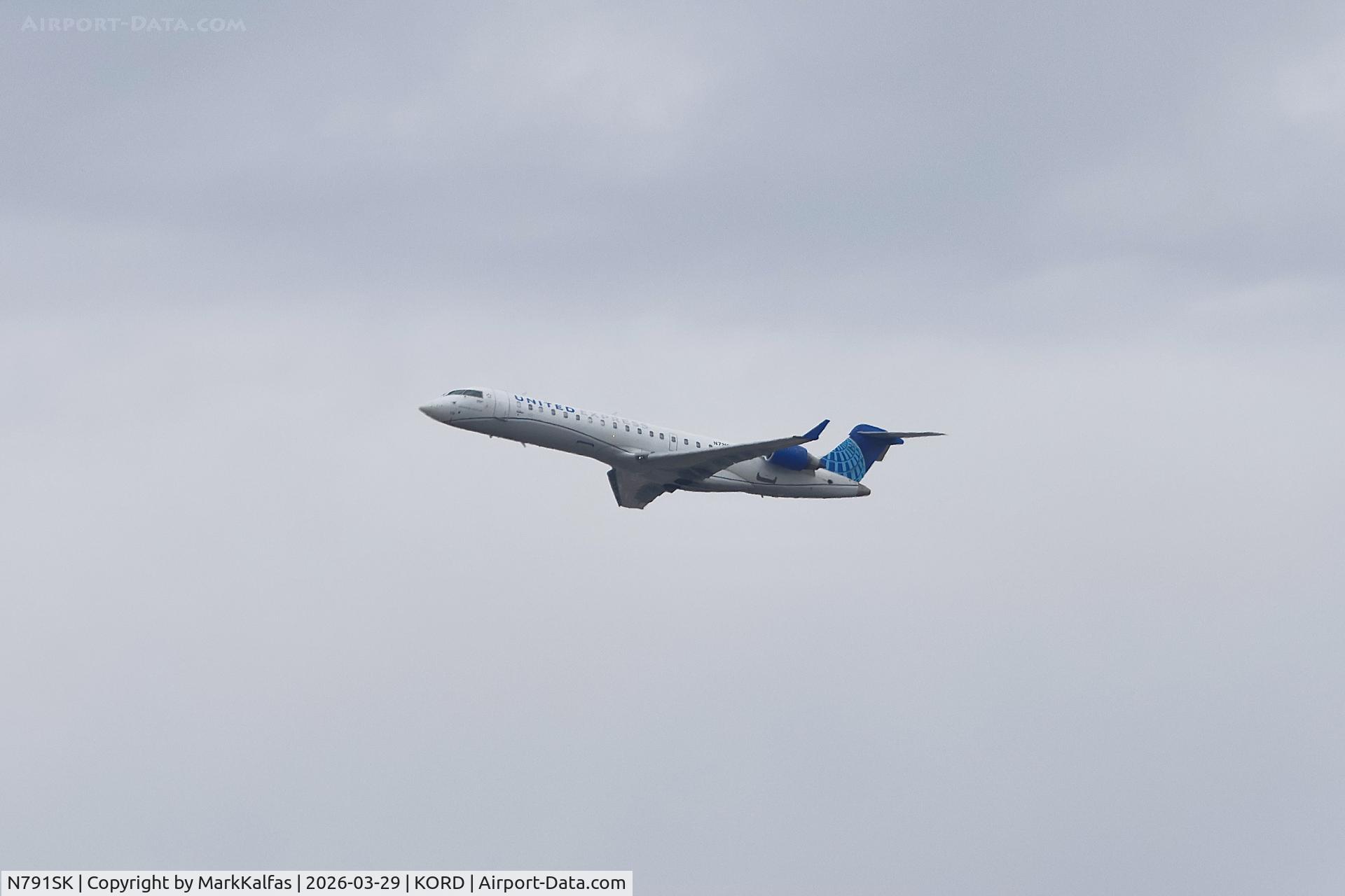 N791SK, 2009 Bombardier CRJ-700 (CL-600-2C10) Regional Jet, c/n 10293, CRJ7 SkyWest / United Express Canadair Regional Jet CRJ-550 N791SK departing 28R KORD