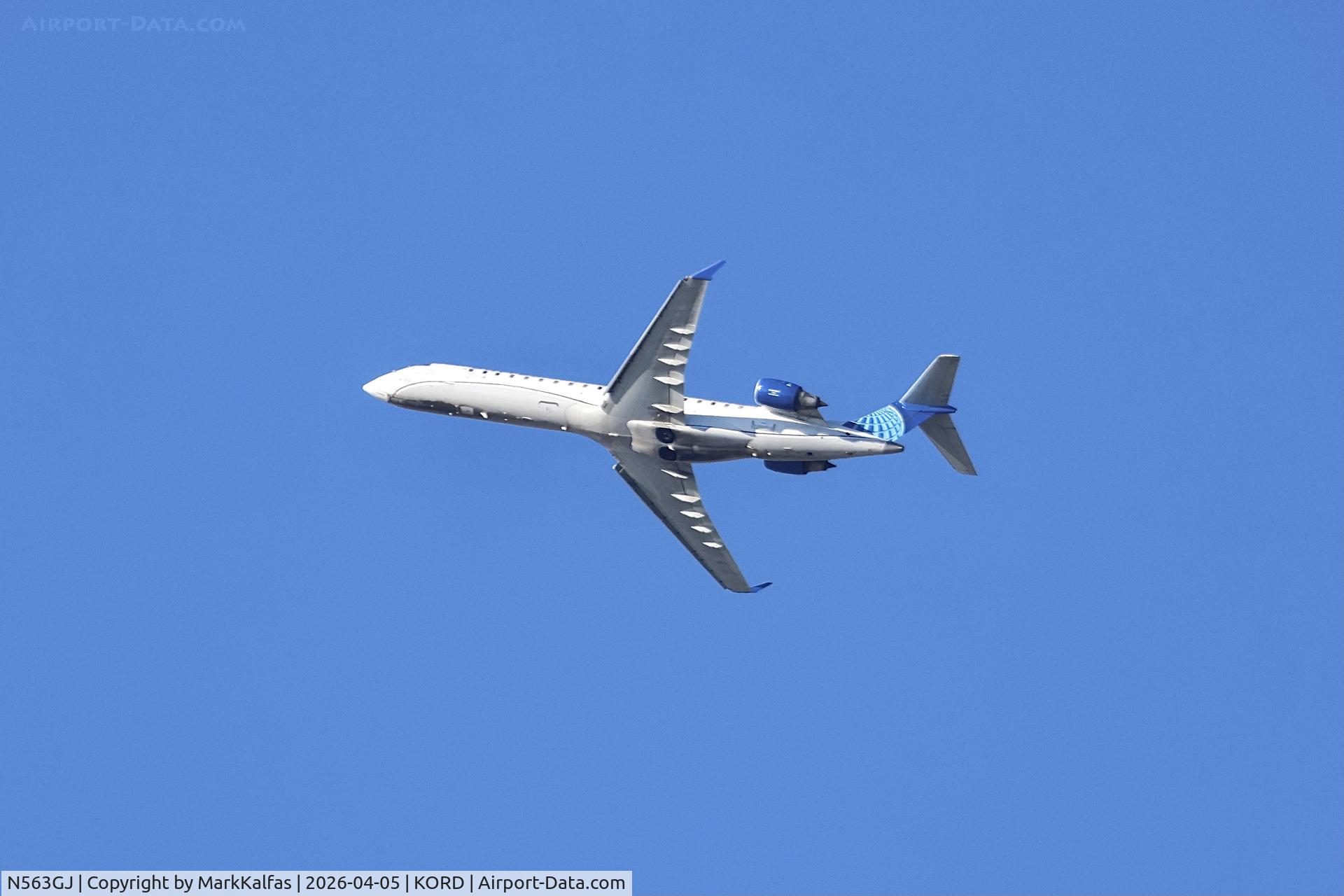 N563GJ, 2002 Bombardier CRJ-701 (CL-600-2C10) Regional Jet, c/n 10058, CRJ7 GoJet / United Express Canadair Regional Jet CRJ-550 N563GJ departing 28R KORD