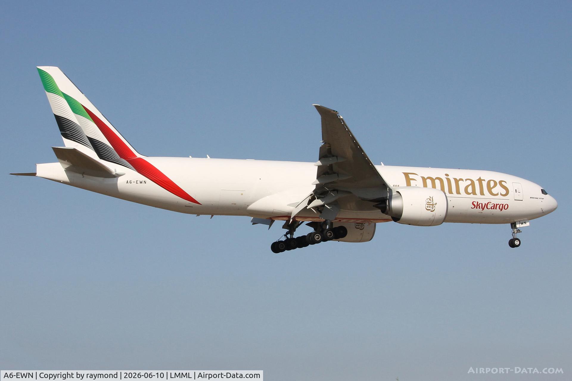 A6-EWN, Boeing 777-F1H, c/n 70439, Boeing 777-F1H reg A6-EWN of Emirates SkyCargo on approach for RW31 landing in Malta.