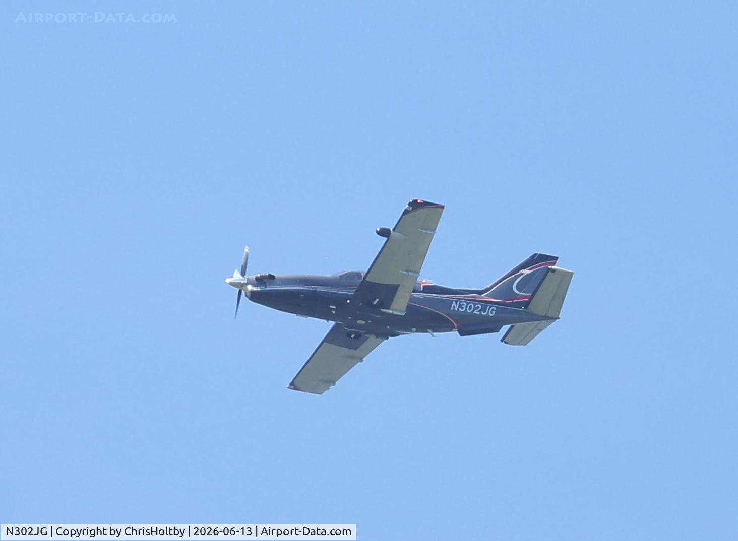 N302JG, 2004 Socata TBM-700, c/n 302, Over Woolbeding Common, West Sussex