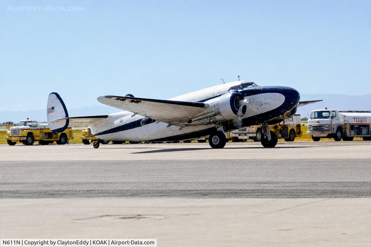 N611N, Lockheed 18-56 Lodestar, c/n 2555, North Oakland airport in California 1970's or 1980's