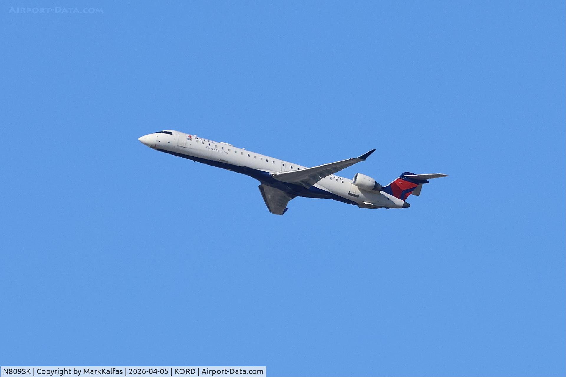 N809SK, 2006 Bombardier CRJ-900ER (CL-600-2D24), c/n 15086, CRJ9 SkyWest / Delta Connection Bombardier CRJ-900ER, N809SK departing 27L KORD.
