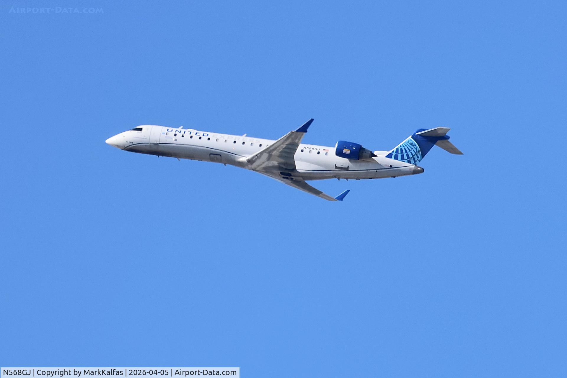 N568GJ, 2003 Bombardier CRJ-700 (CL-600-2C10) Regional Jet, c/n 10104, CRJ7 GoJet Airlines /United Express Bombardier CRJ-550, N568GJ departing 27L KORD.