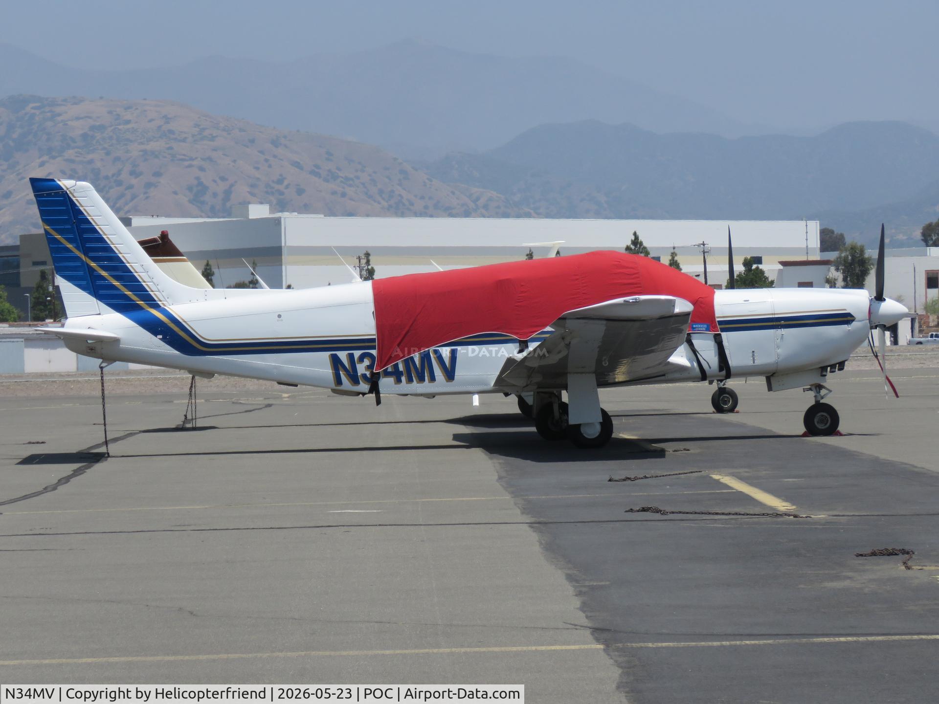 N34MV, 1983 Piper PA-32R-301, c/n 32R-8413006, Covered and parked in transit parking