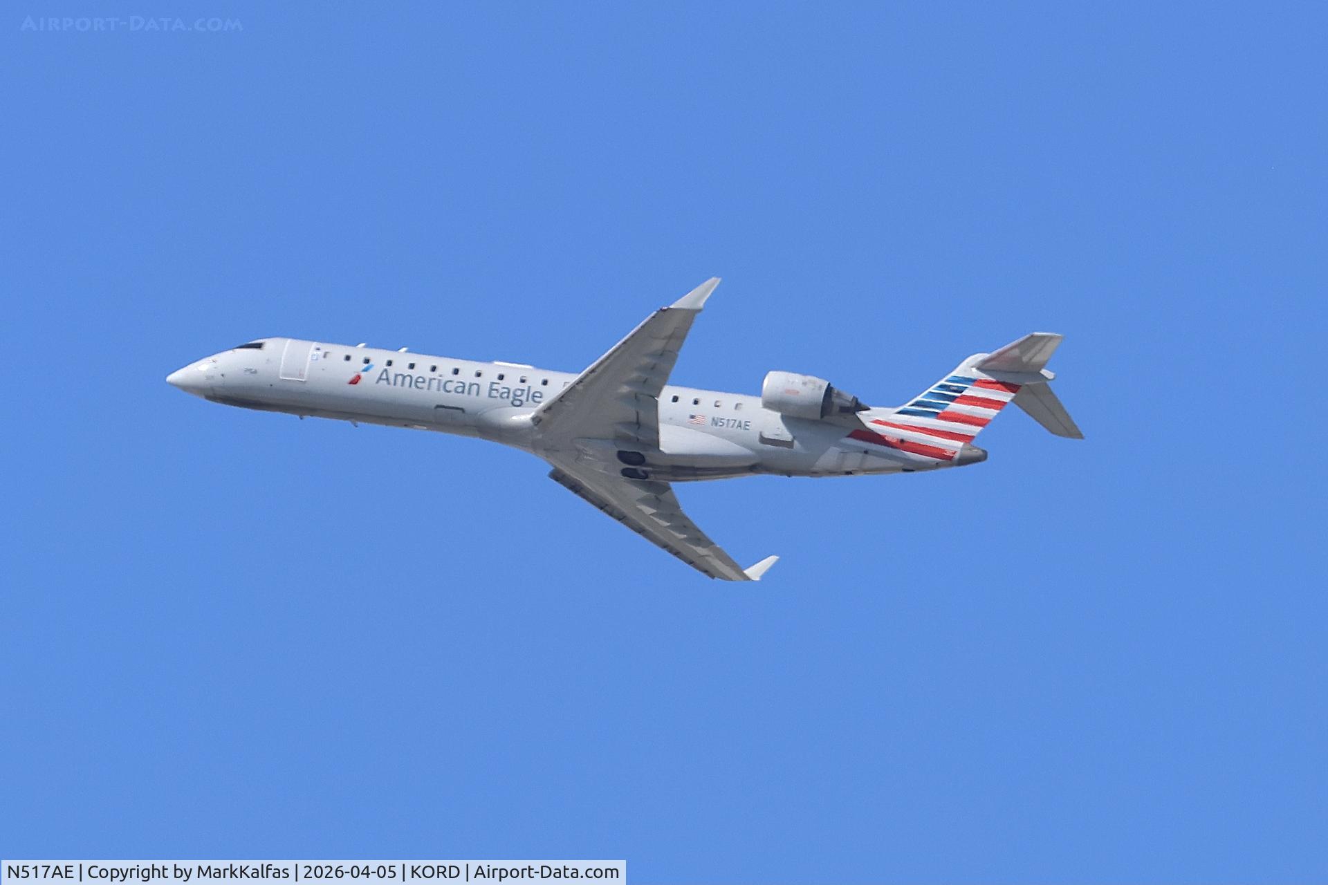 N517AE, 2003 Bombardier CRJ-701ER (CL-600-2C10) Regional Jet, c/n 10124, CRJ7 PSA / American Eagle Bombardier CRJ-701ER N517AE departing 27L KORD