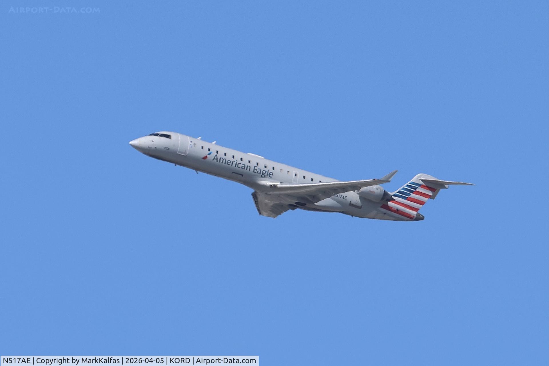 N517AE, 2003 Bombardier CRJ-701ER (CL-600-2C10) Regional Jet, c/n 10124, CRJ7 PSA / American Eagle Bombardier CRJ-701ER N517AE departing 27L KORD