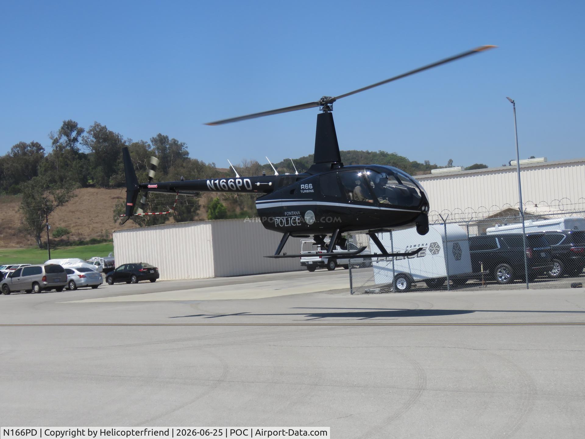 N166PD, 2012 Robinson R66, c/n 0101, Air taxiing