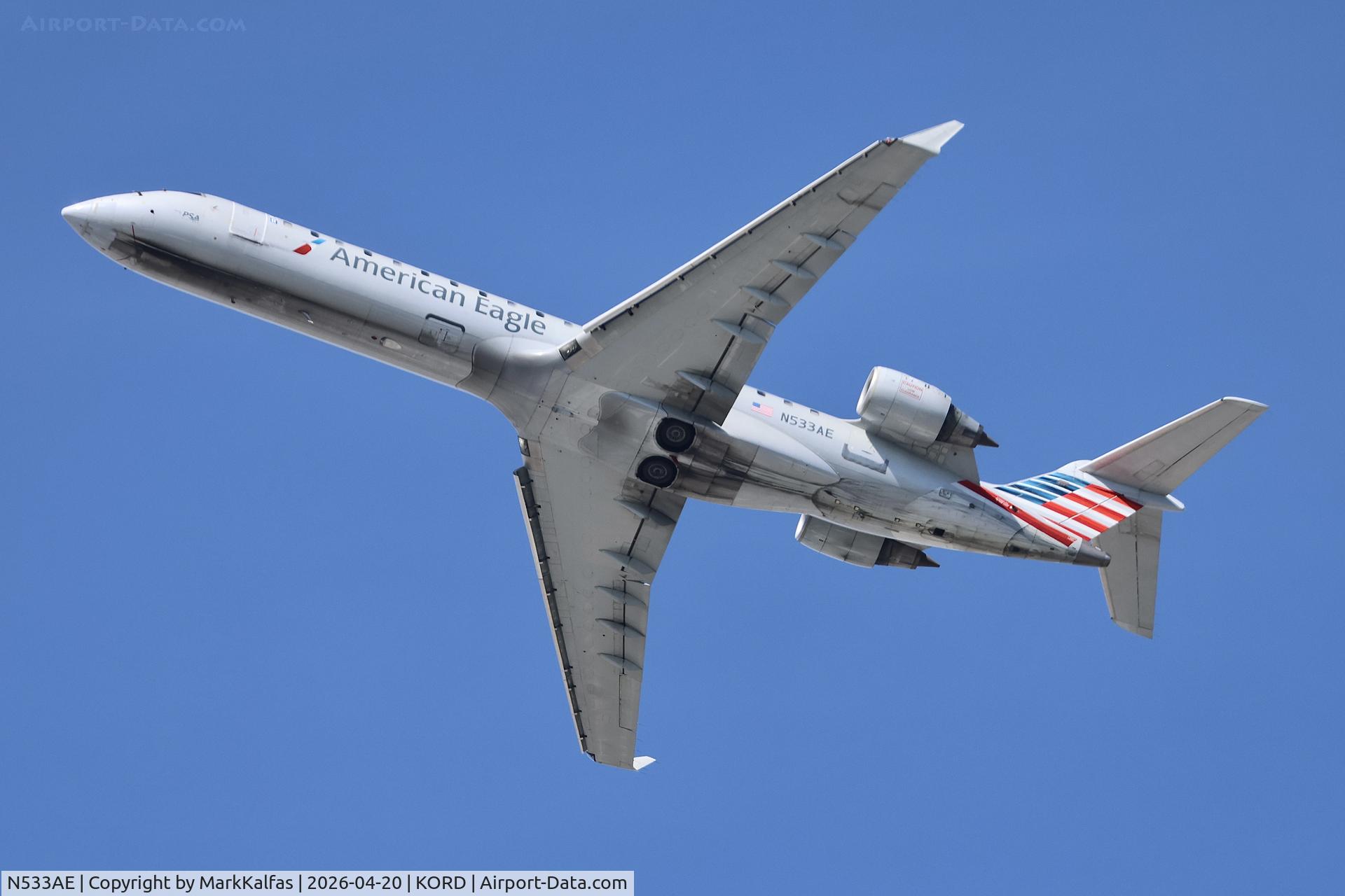 N533AE, Bombardier CRJ-702 (CL-600-2C10) Regional Jet, c/n 10311, CRJ7 American / PSA Canadair Regional Jet CRJ-700, N533AE departing 28R KORD