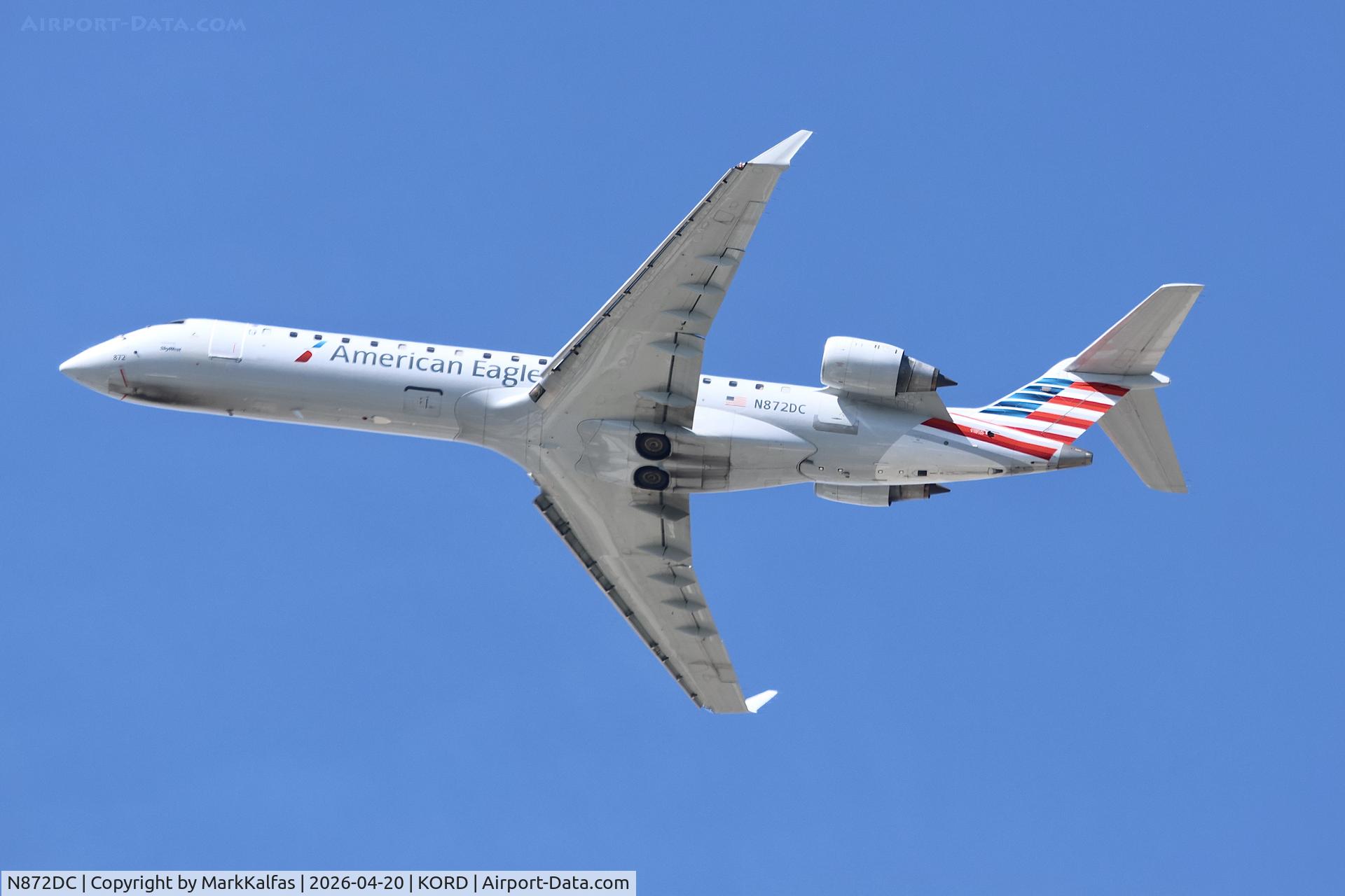 N872DC, 2011 Bombarder CRJ-701ER, c/n 10322, CRJ7 SkyWest / American Eagle Bombardier CRJ-701ER. N872DC departing 28R KORD