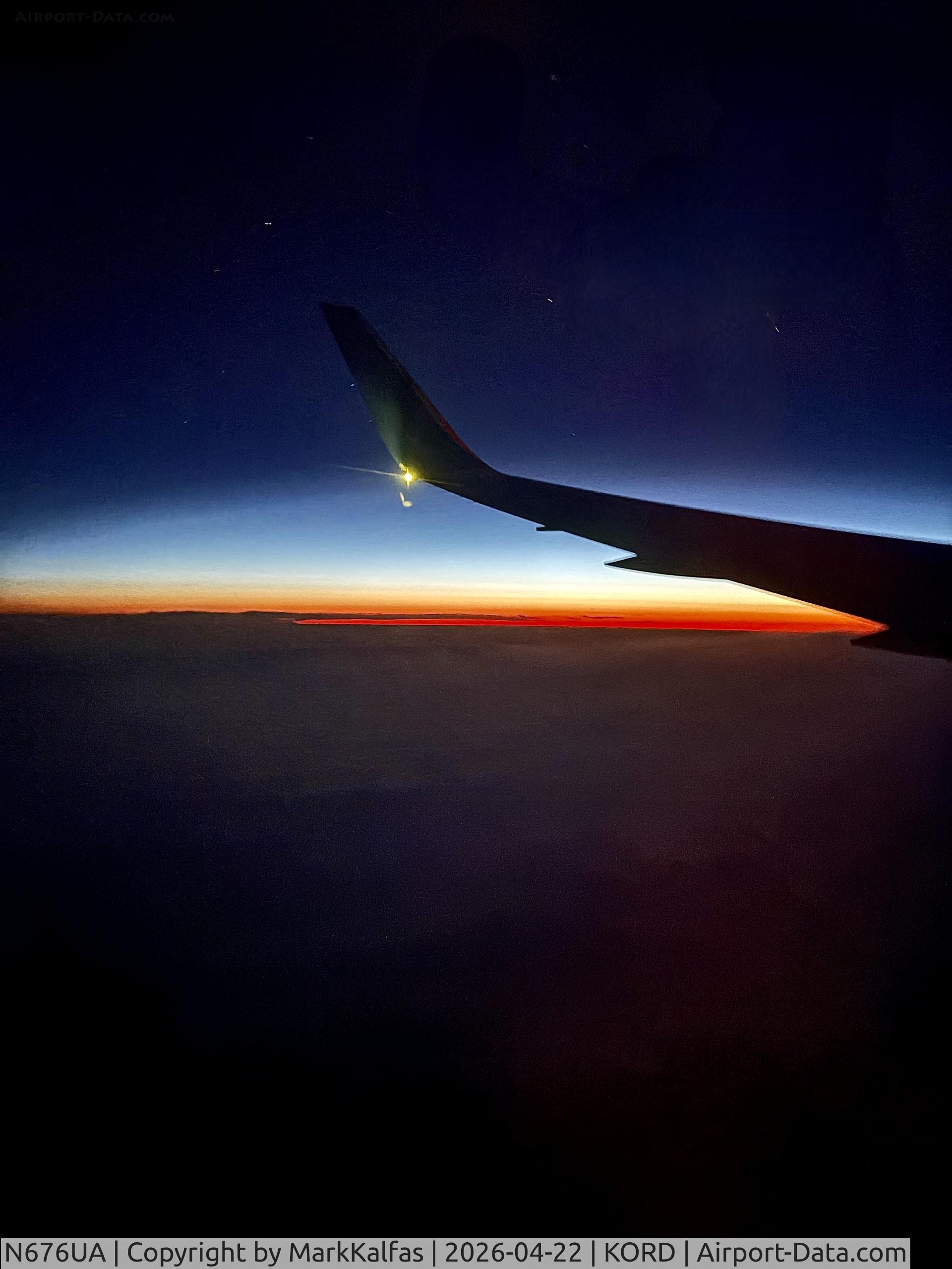 N676UA, 2001 Boeing 767-322/ER, c/n 30028, B763 United Boeing 767-322 N676UA, UA#929 ORD-LHR ,sunrise over the Atlantic