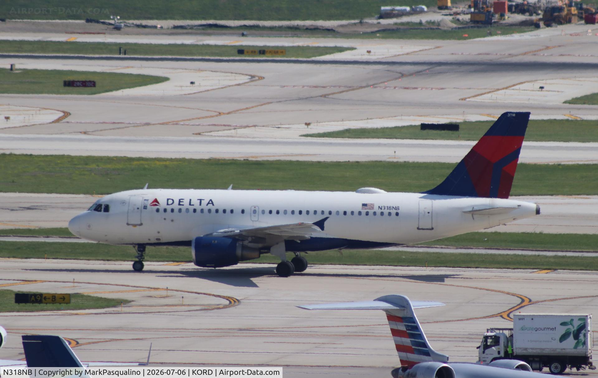Aircraft N318NB, 2000 Airbus A319-114, c/n 1325, Airbus A319-114, at KORD, photo by MarkPasqualino