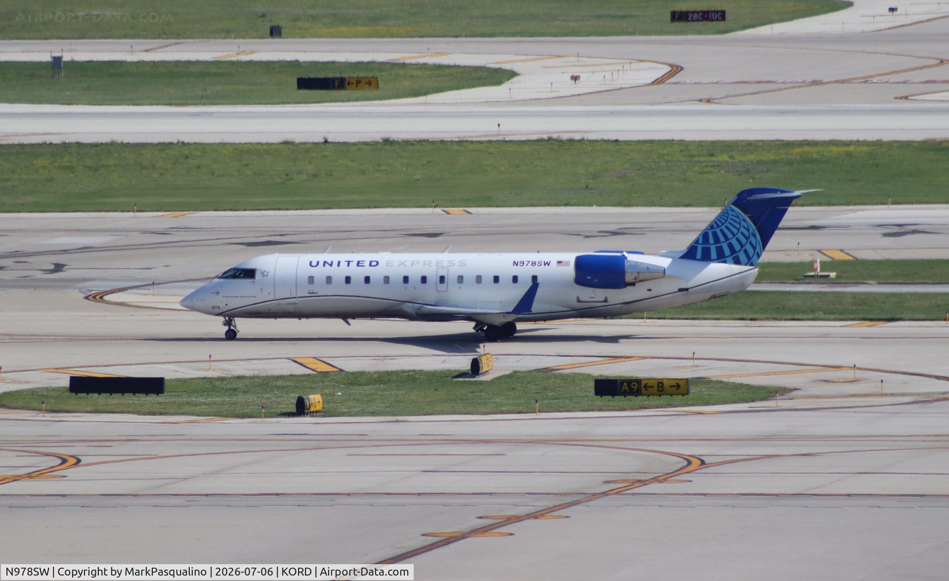 Aircraft N978SW, 2004 Bombardier CRJ-200ER (CL-600-2B19), c/n 7953, CL-600-2B19, at KORD, photo by MarkPasqualino
