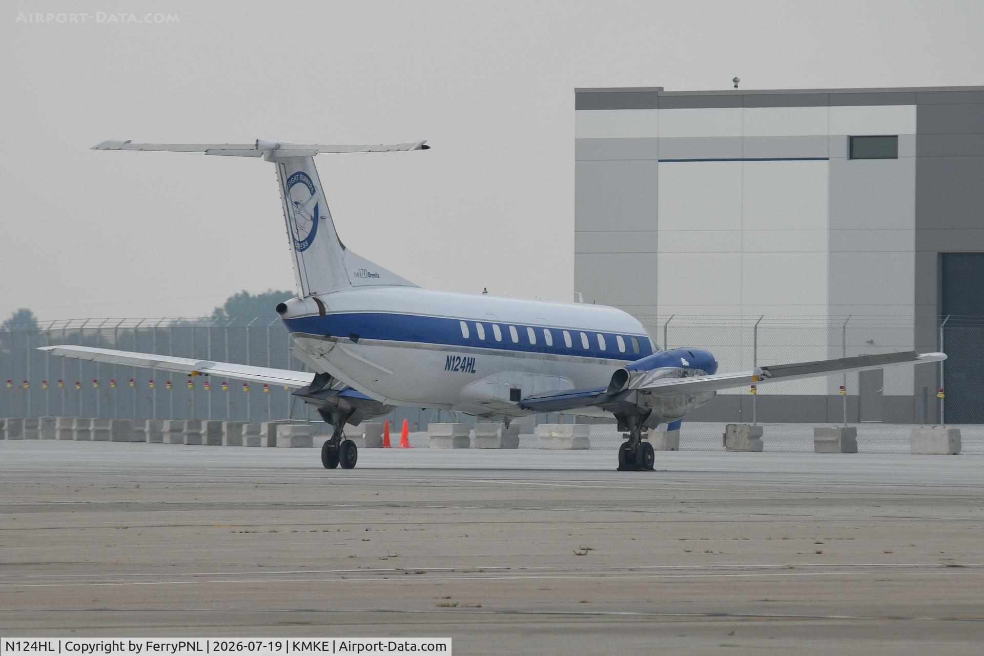 Aircraft N124HL, 1994 Embraer EMB-120ER Brasilia, c/n 120.284, Freight Runner Express EMB120 parked, at KMKE, photo by FerryPNL