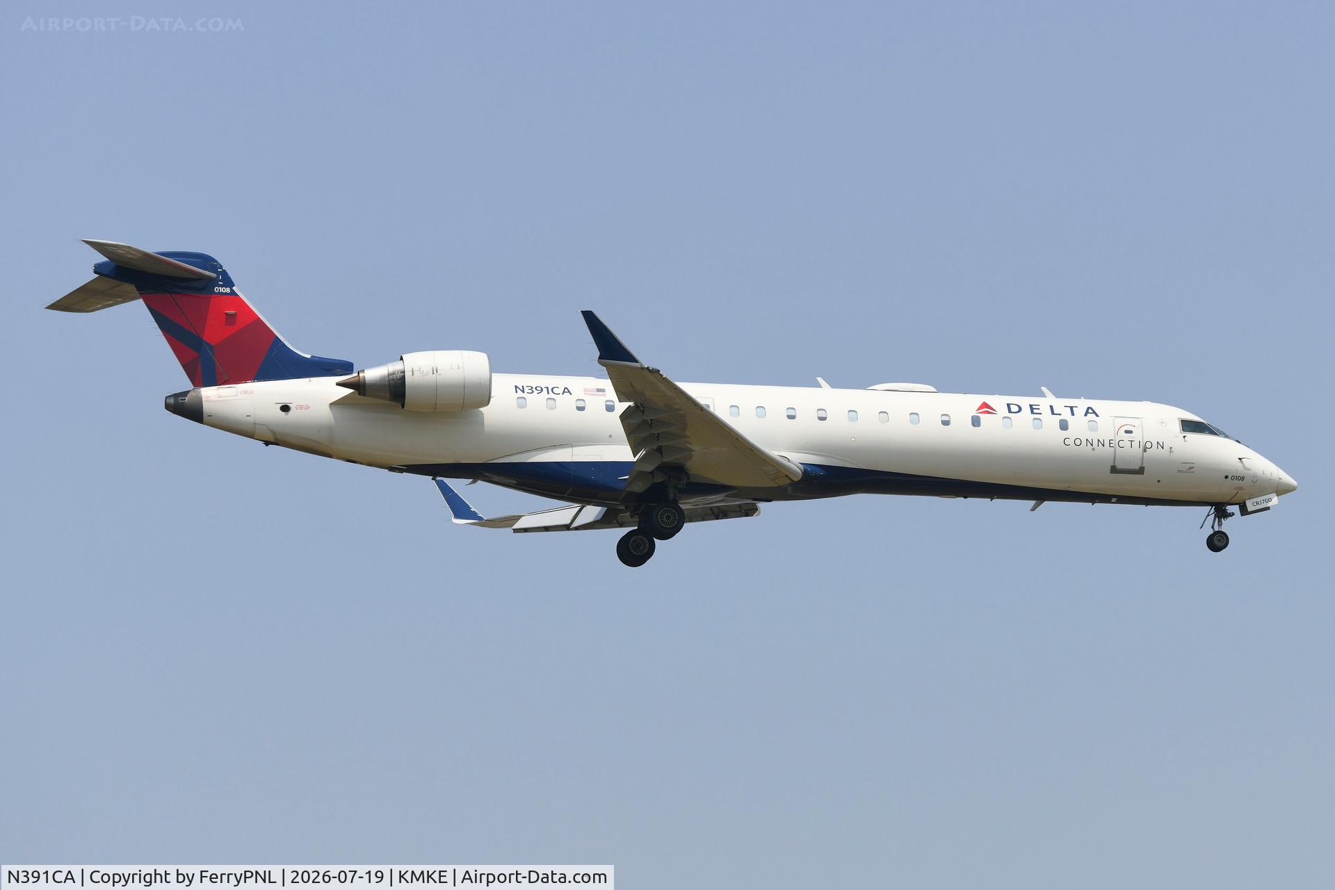 Aircraft N391CA, 2003 Bombardier CRJ-701ER (CL-600-2C10) Regional Jet, c/n 10108, Delta Connection CL700, at KMKE, photo by FerryPNL