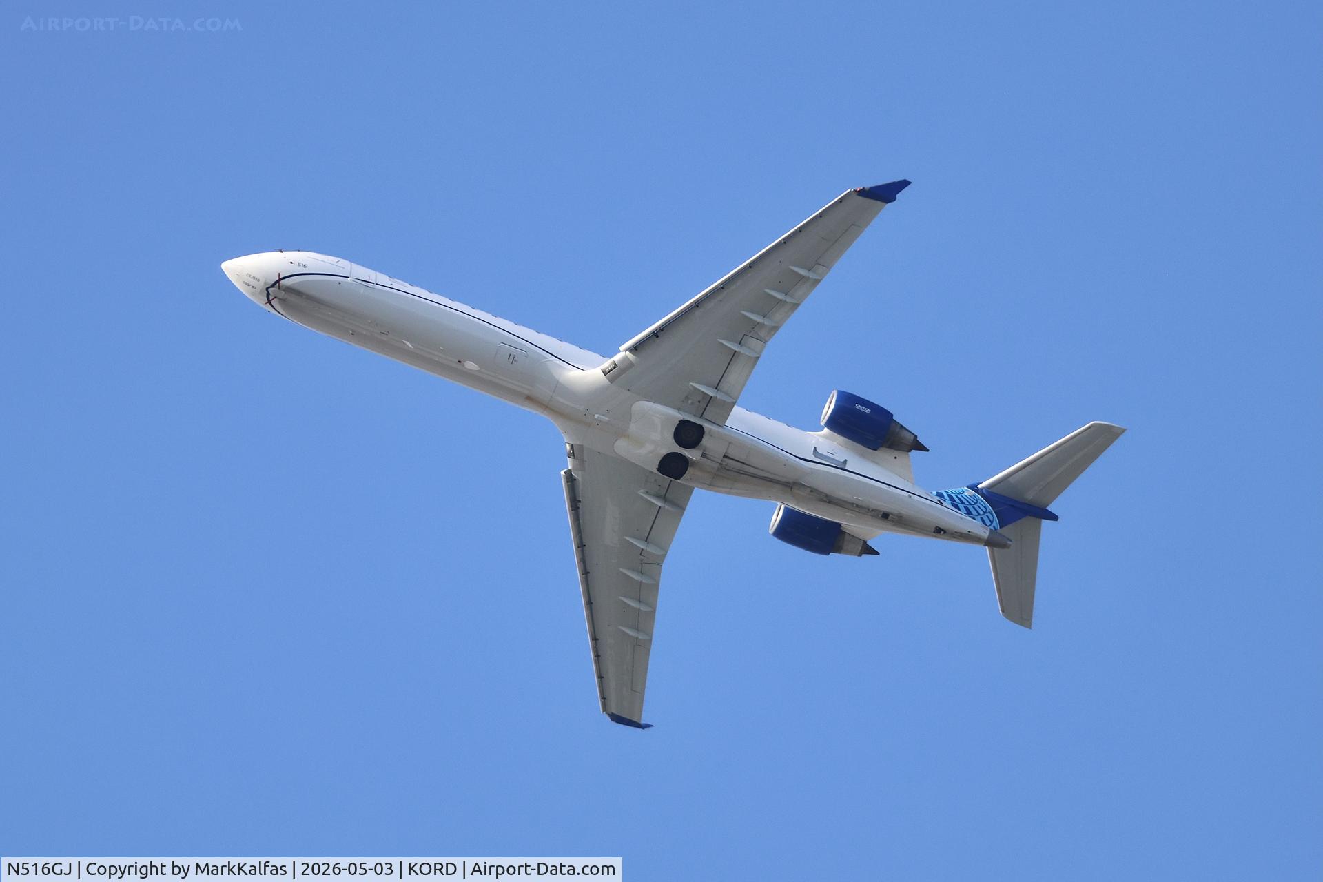 Aircraft N516GJ, 2006 Bombardier CRJ-700 (CL-600-2C10) Regional Jet, c/n 10245, CRJ7 SkyWest / United Express Bombardier CRJ-550 N516GJ departing 28R KORD, at KORD, photo by MarkKalfas