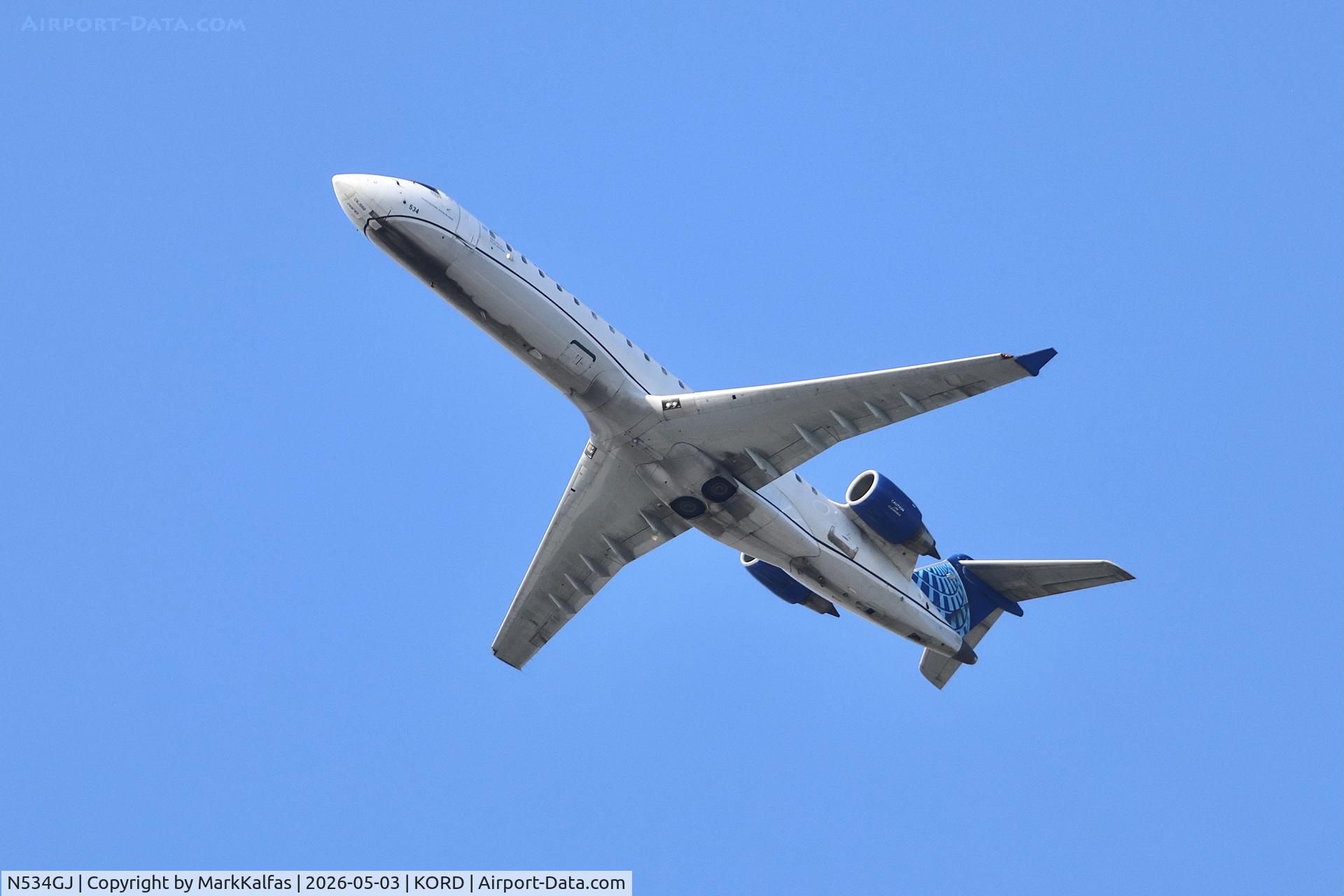 Aircraft N534GJ, 2005 Bombardier CRJ-702 (CL-600-2C10) Regional Jet, c/n 10225, CRJ7 GoJet / United Express Bombardier CRJ-550 N534GJ departing 28R KORD, at KORD, photo by MarkKalfas