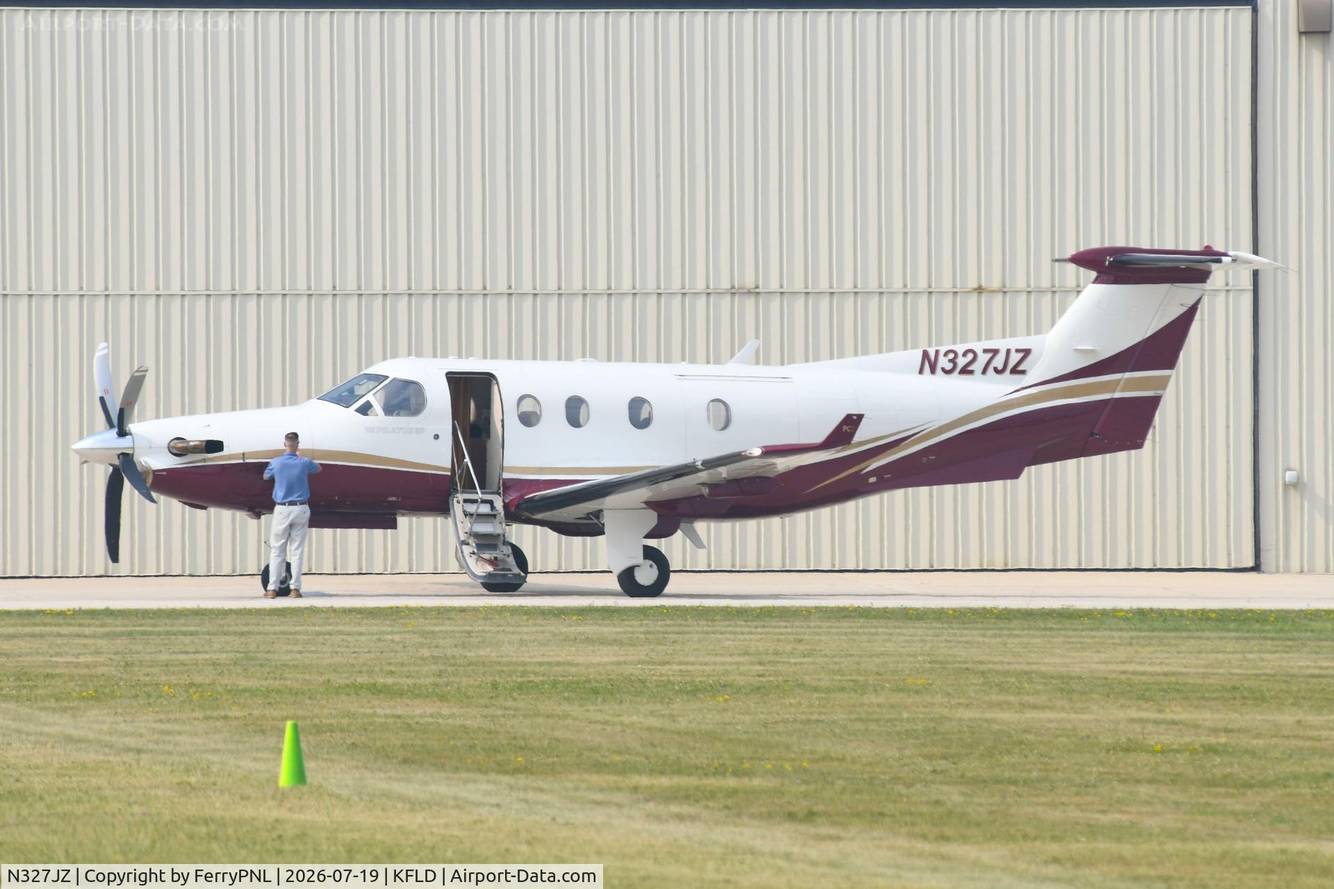 Aircraft N327JZ, 2000 Pilatus PC-12/45, c/n 327, DHZ LLC PC12 just arrived, at KFLD, photo by FerryPNL