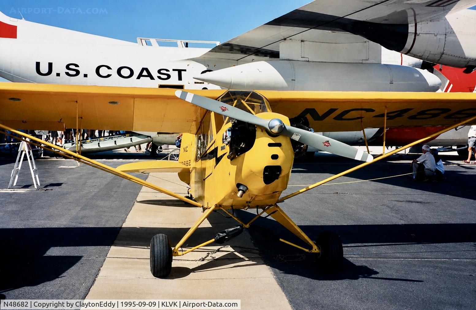 N48682, 1942 Piper J3C-65 Cub, c/n G-86, Wings for Charity Airshow Livermore airport in California 09-95