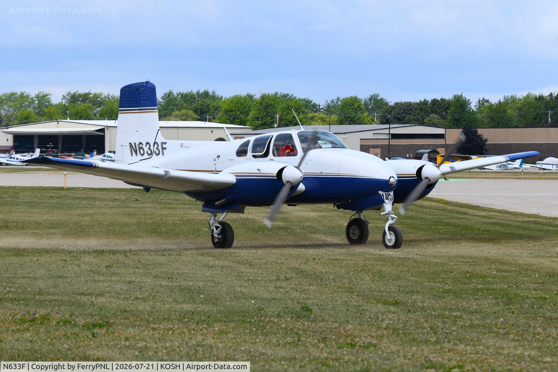 N633F, 1954 Beech B50, c/n CH-70, Be50 taxying after arrival in OSH