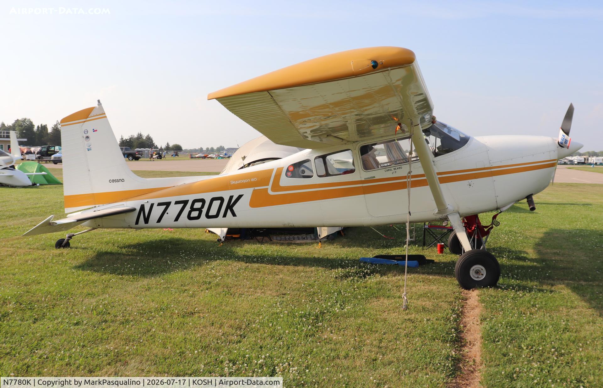 Aircraft N7780K, 1976 Cessna 180J, c/n 18052729, Cessna 180J, at KOSH, photo by MarkPasqualino