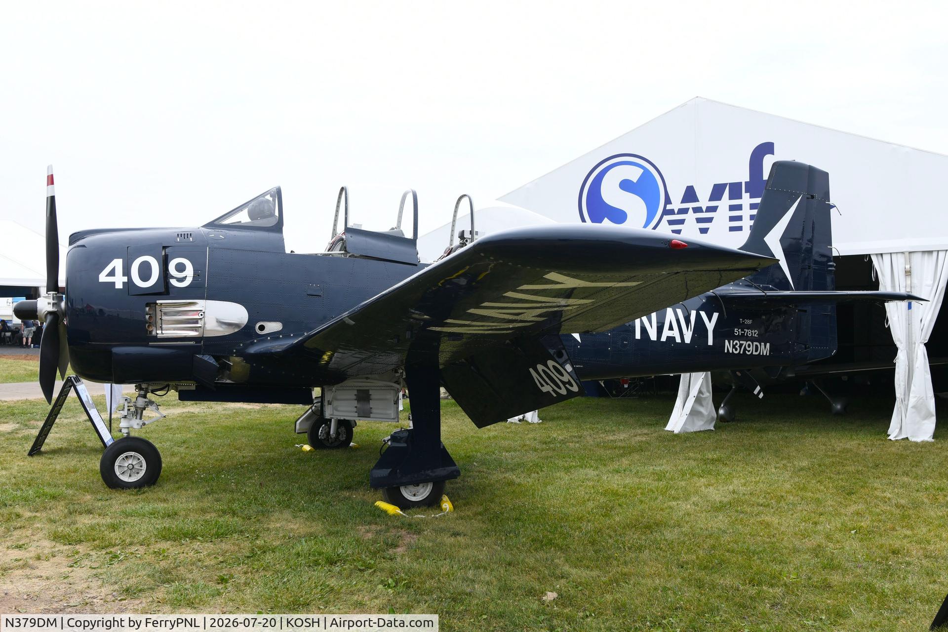 Aircraft N379DM, 1951 North American T-28A Trojan, c/n 174-665, Trojan on display, at KOSH, photo by FerryPNL