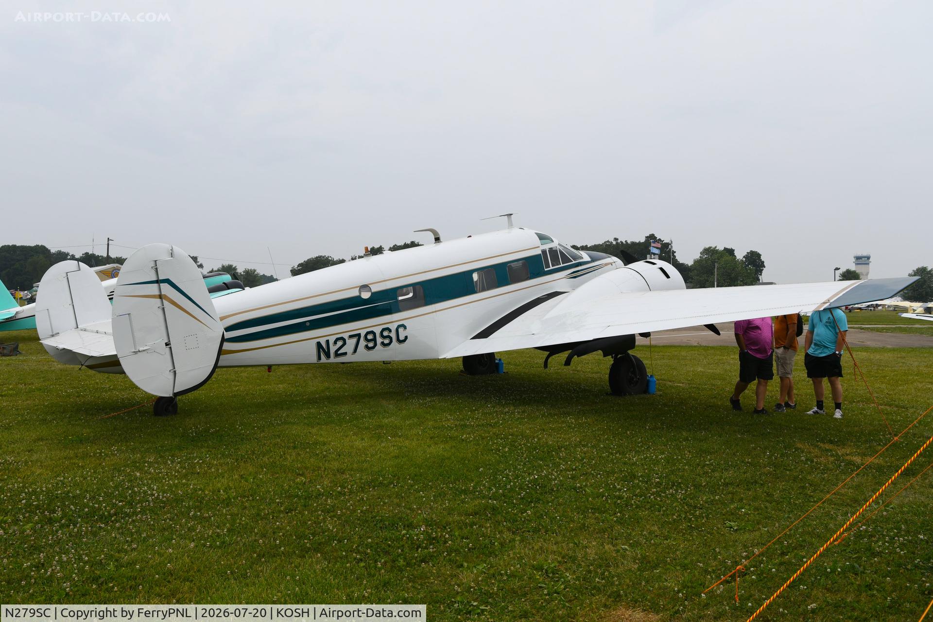 Aircraft N279SC, 1955 Beech E18S, c/n BA-74, Be-E18S parked among the classics, at KOSH, photo by FerryPNL