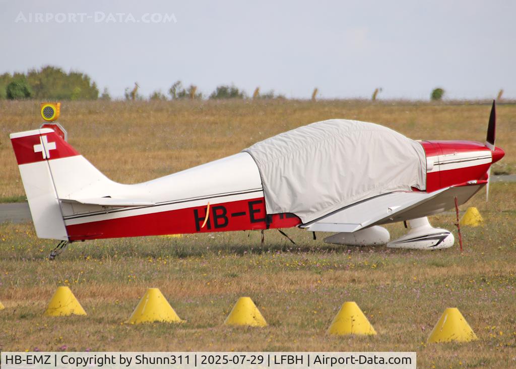 Aircraft HB-EMZ, 1957 CEA Jodel DR-221 Dauphin, c/n 79, Parked in the grass..., at LFBH, photo by Shunn311