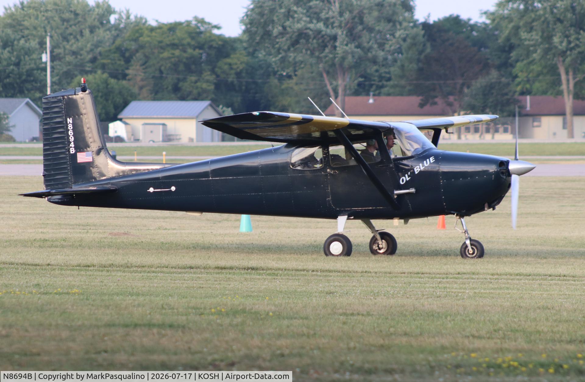 Aircraft N8694B, 1957 Cessna 172, c/n 36394, Cessna 172, at KOSH, photo by MarkPasqualino