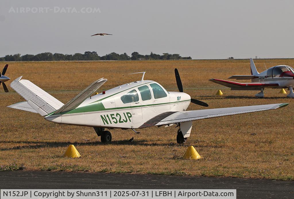 N152JP, 1966 Beech V35 Bonanza, c/n D-8322, Parked in the grass...