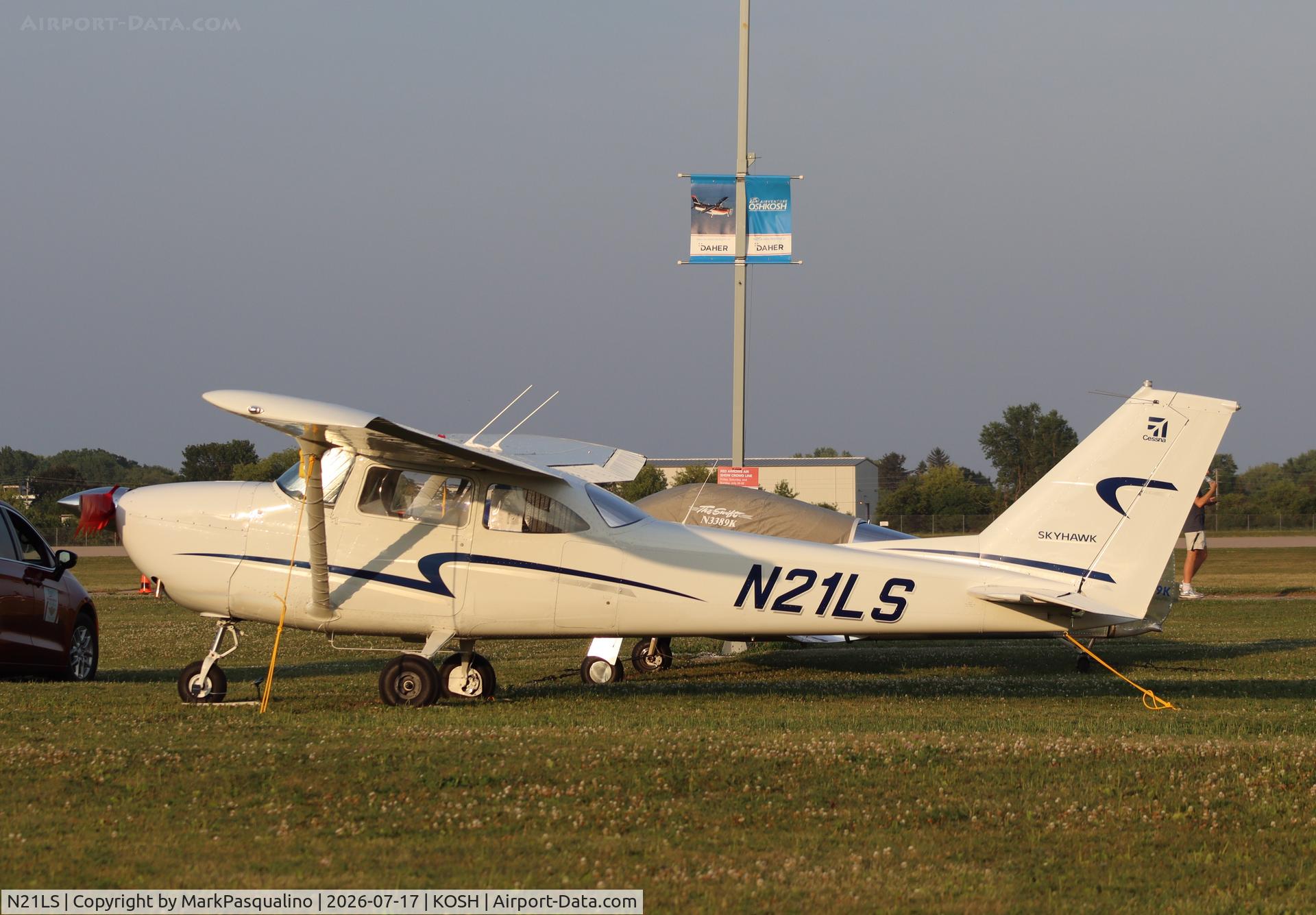 Aircraft N21LS, 1964 Cessna 172E, c/n 17251817, Cessna 172E, at KOSH, photo by MarkPasqualino