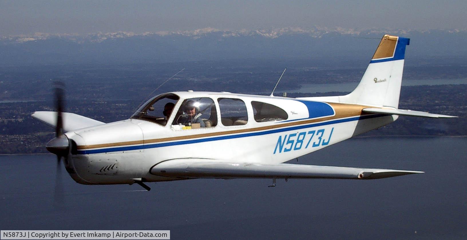 N5873J, 1965 Beech 35-C33 Debonair C/N CD-926, Over the Puget Sound