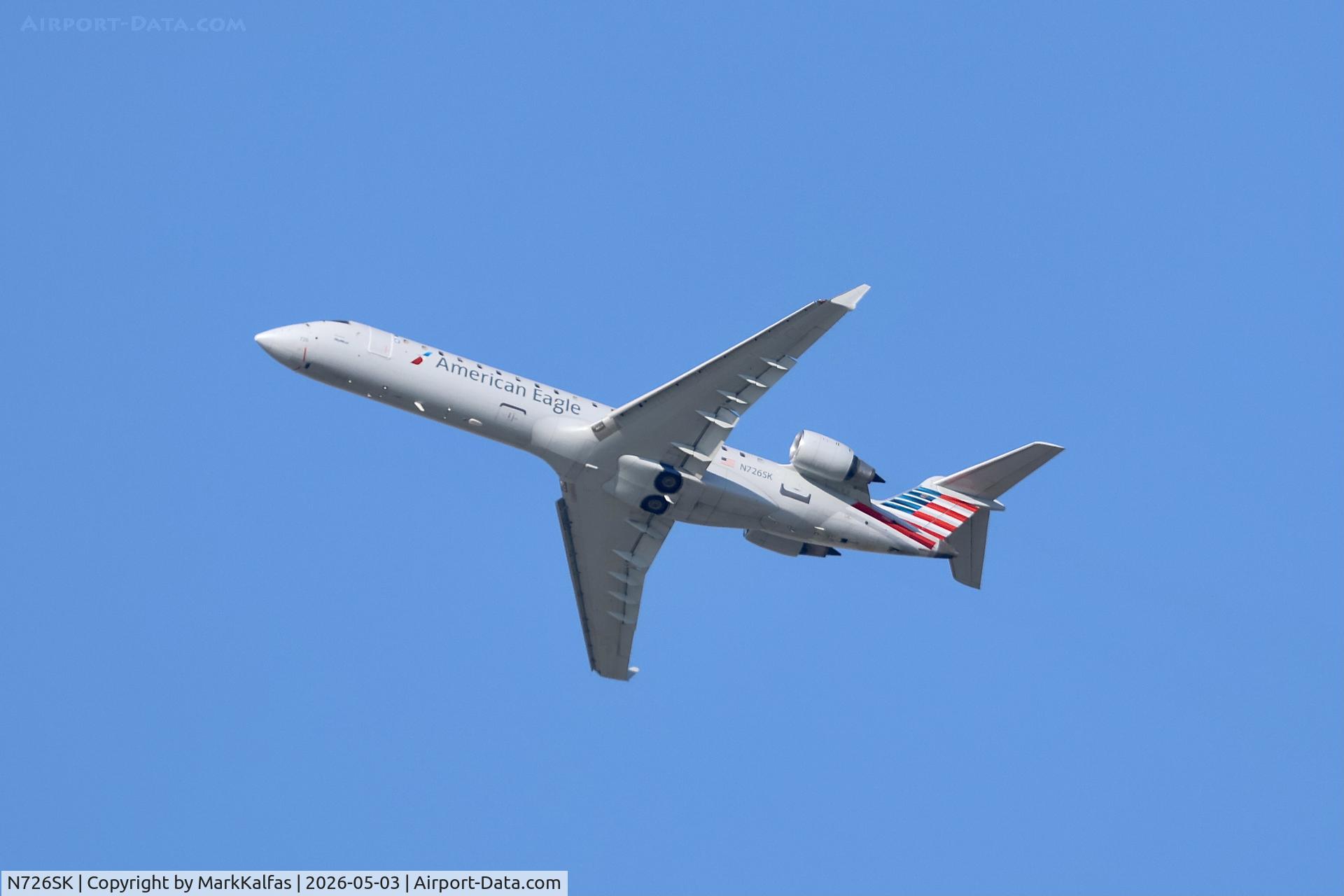 Aircraft N726SK, 2005 Bombardier CRJ-701ER (CL-600-2C10) Regional Jet, c/n 10190, CRJ7 SkyWest / American Eagle Bombardier CRJ-701ER N726SK departing 28R KORD, photo by MarkKalfas