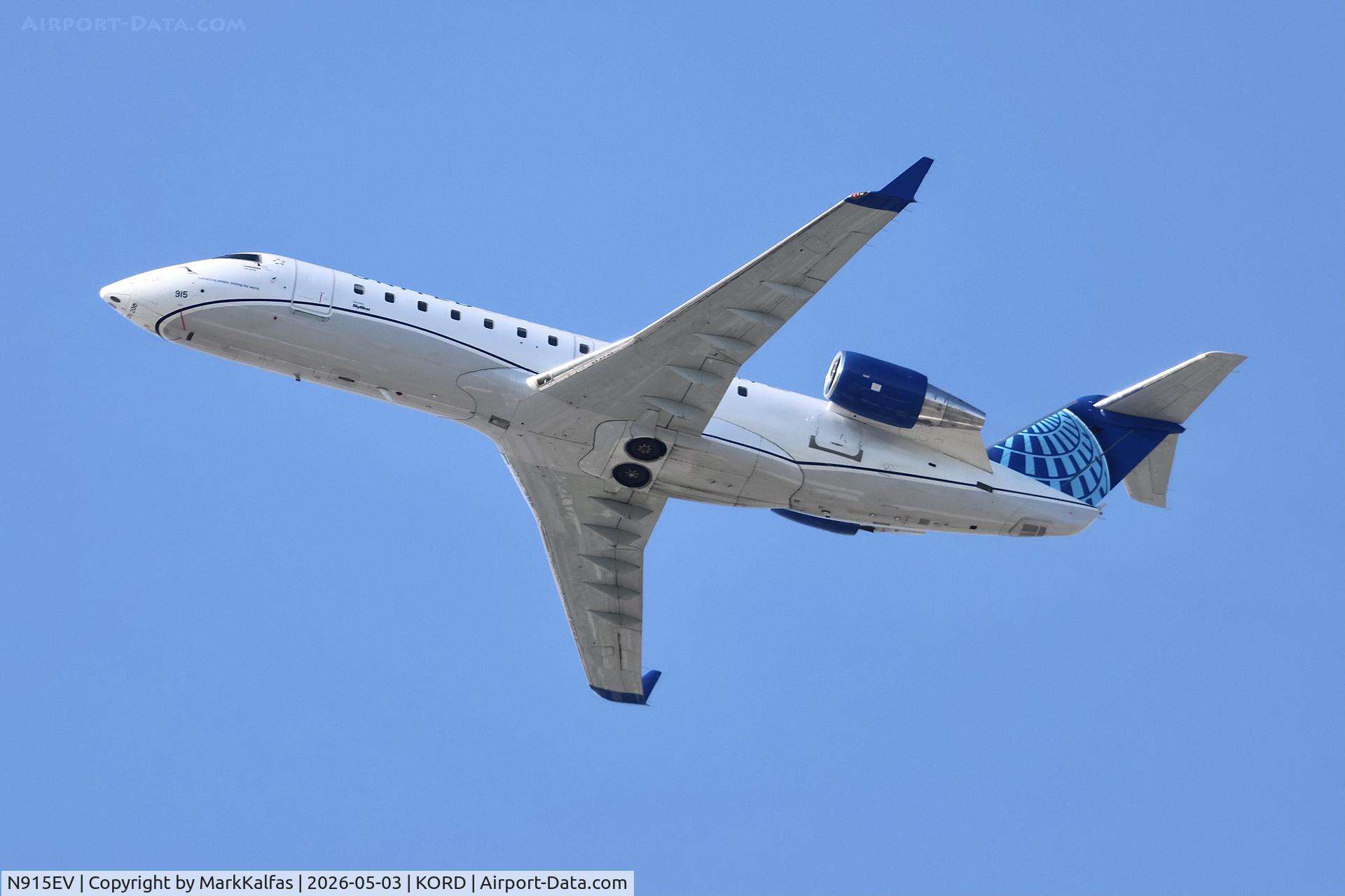 Aircraft N915EV, 2003 Bombardier CRJ-200ER (CL-600-2B19), c/n 7754, CRJ2 SkyWest/United Express Bombardier CRJ-200ER N915EV departing 28R KORD, at KORD, photo by MarkKalfas