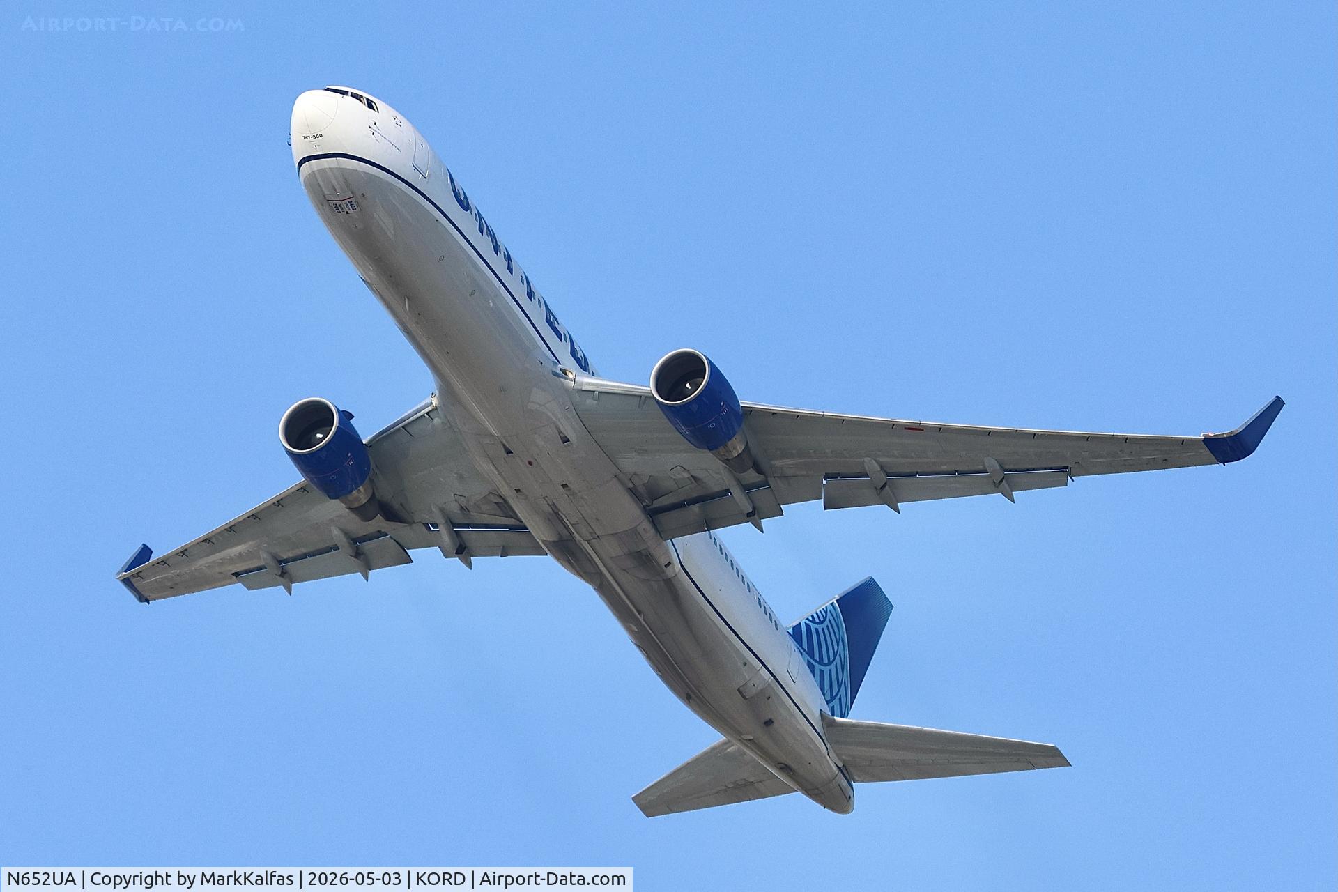 Aircraft N652UA, 1992 Boeing 767-322, c/n 25390 l/n 457, B763 United Boeing 767-322, N652UA departing 28R KORD, at KORD, photo by MarkKalfas