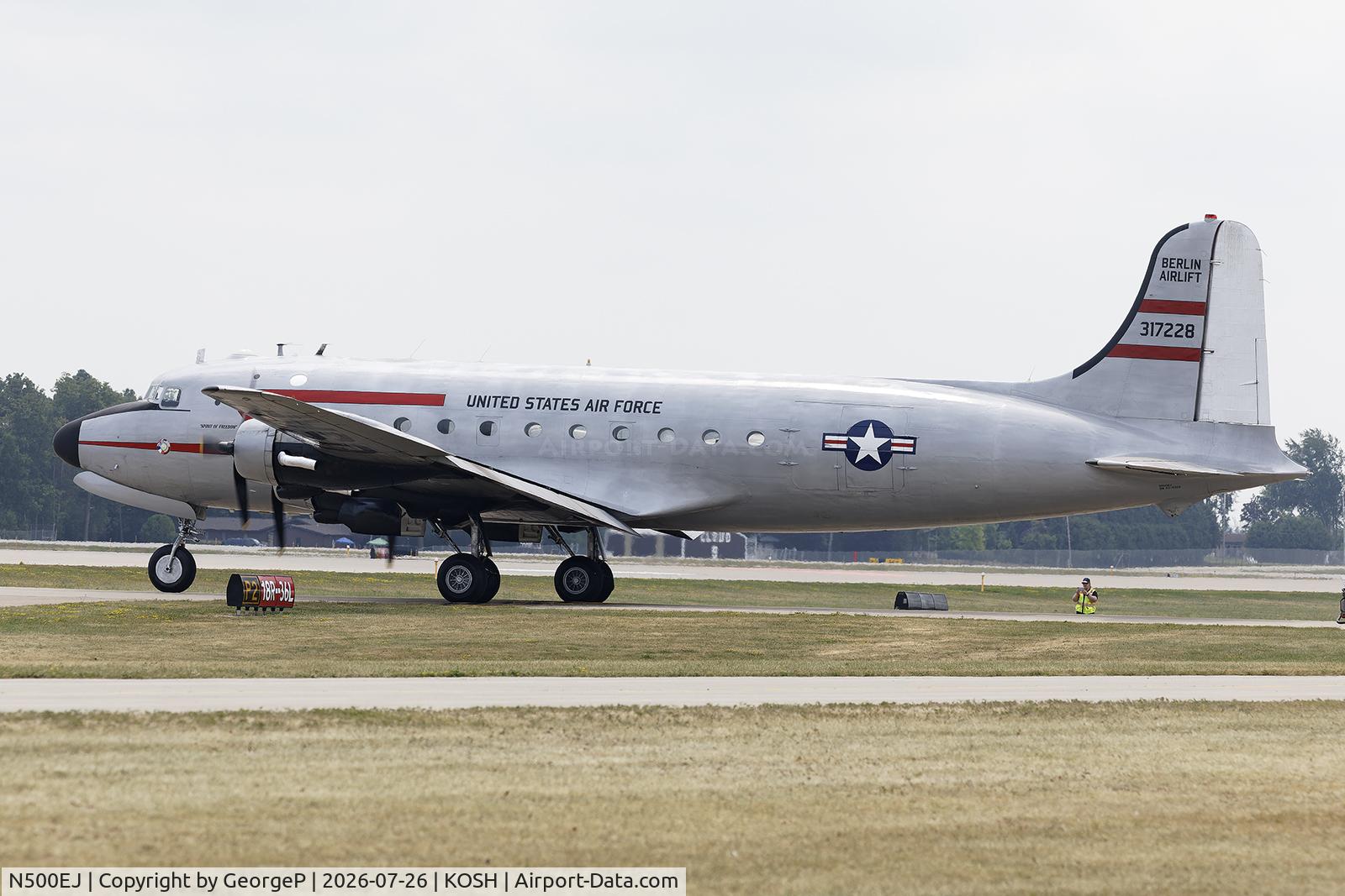 Aircraft N500EJ, 1945 Douglas C-54E Skymaster (DC-4A), c/n DO316 l/n 27370, Airventure 2026., at KOSH, photo by GeorgeP