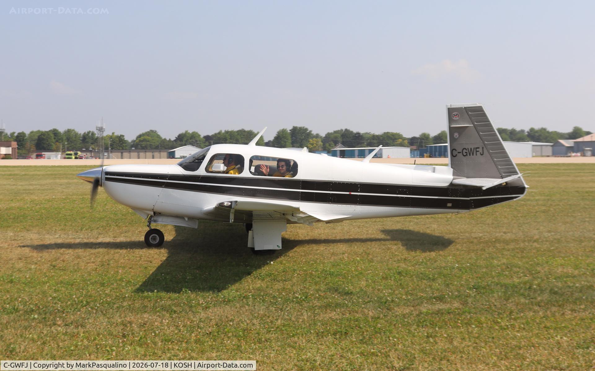 Aircraft C-GWFJ, 1986 Mooney M20K, c/n 25 1073, Mooney M20K, at KOSH, photo by MarkPasqualino