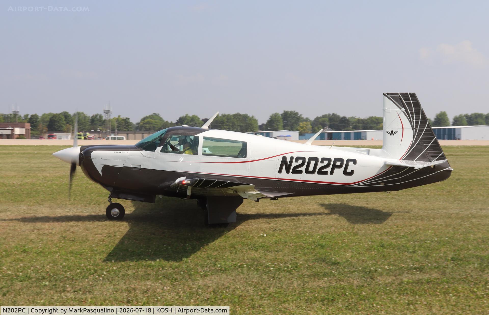 Aircraft N202PC, 1981 Mooney M20J 201, c/n 24-1086, Mooney M20J, at KOSH, photo by MarkPasqualino
