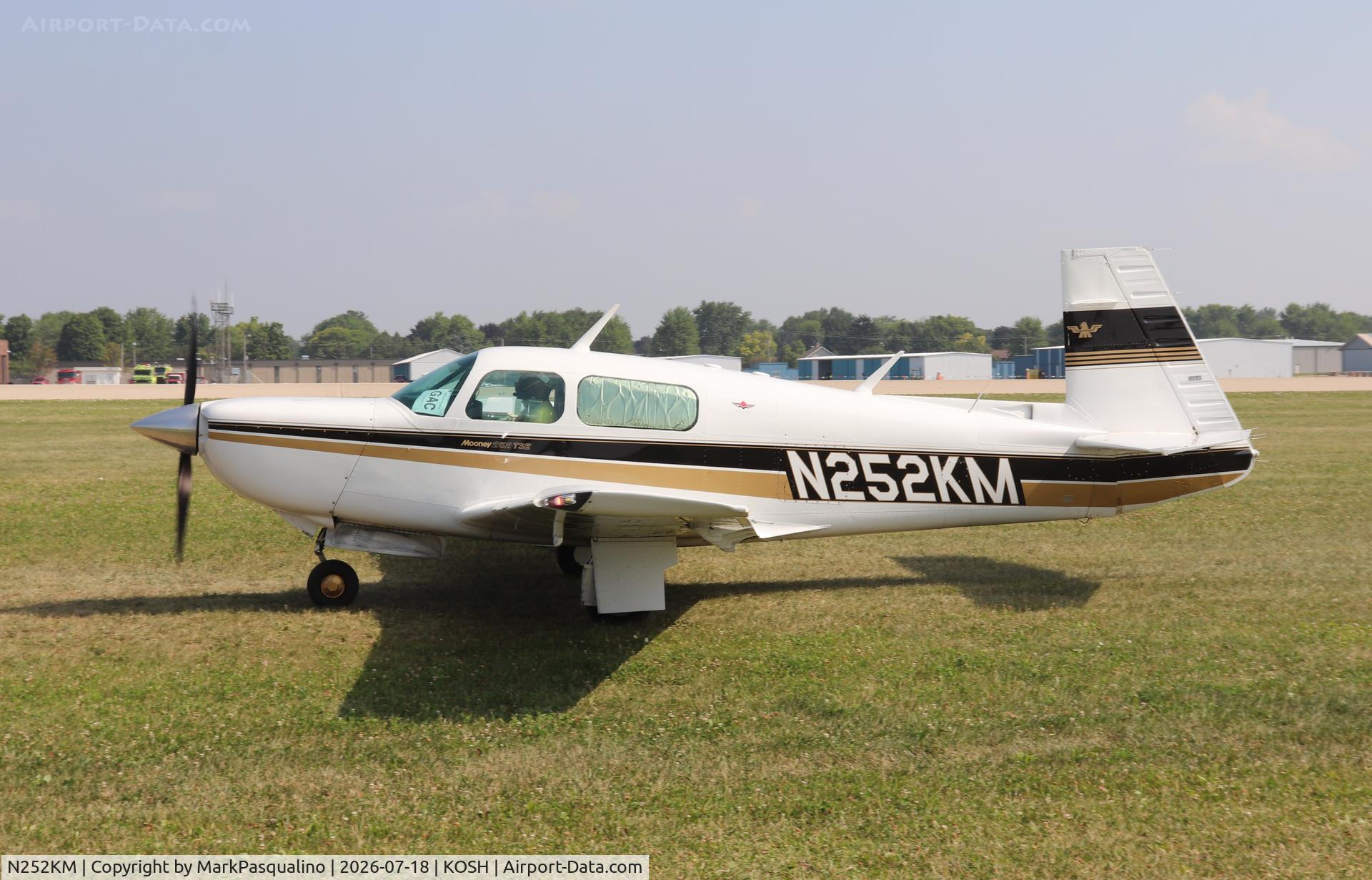 Aircraft N252KM, Mooney M20K, c/n 25-1032, Mooney M20K, at KOSH, photo by MarkPasqualino