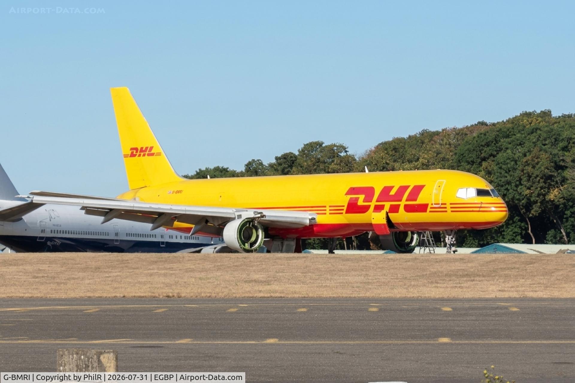 Aircraft G-BMRI, 1989 Boeing 757-236/SF, c/n 24267, G-BMRI 1989 Boeing 757-256(F) DHL Kemble 31.07.26 (2).JPG, at EGBP, photo by PhilR