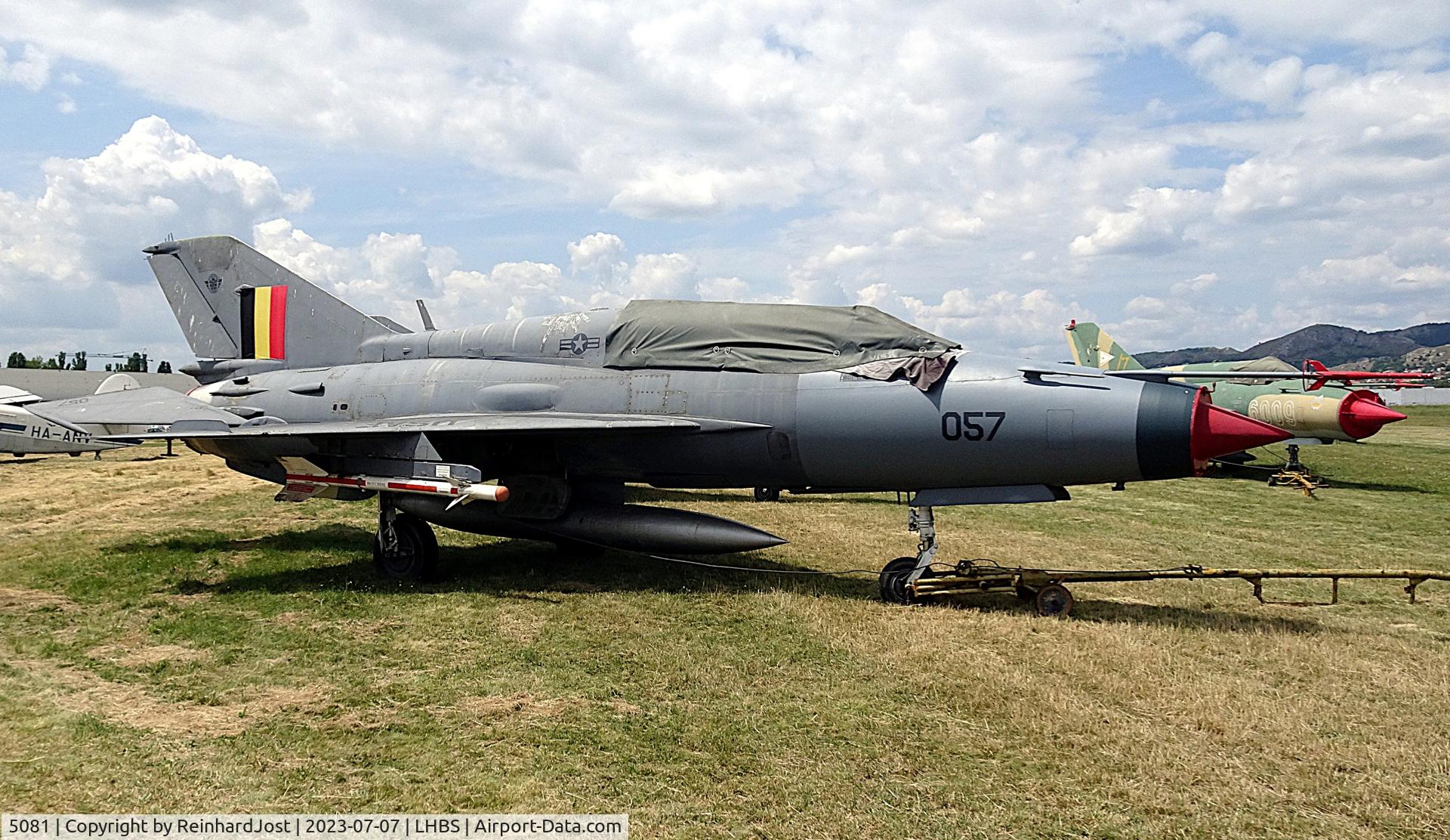 Aircraft 5081, 1974 Mikoyan-Gurevich MiG-21UM, c/n 516915081, Ex-Hungarian Air Force MiG-21UM with a fake Belgian flag on the tail and fake USAF-number (from recent filming work) at a private collection at Budaörs near Budapest, Hungary, at LHBS, photo by ReinhardJost