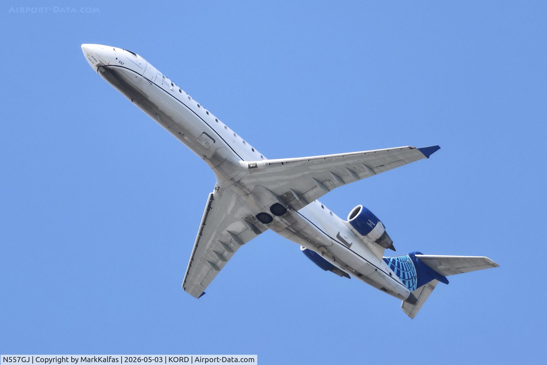 Aircraft N557GJ, 2003 Bombardier CRJ-701 (CL-600-2C10) Regional Jet, c/n 10017, CRJ7 GoJet / United Express Canadair Regional Jet CRJ-550, N557GJ departing 28R KORD, at KORD, photo by MarkKalfas
